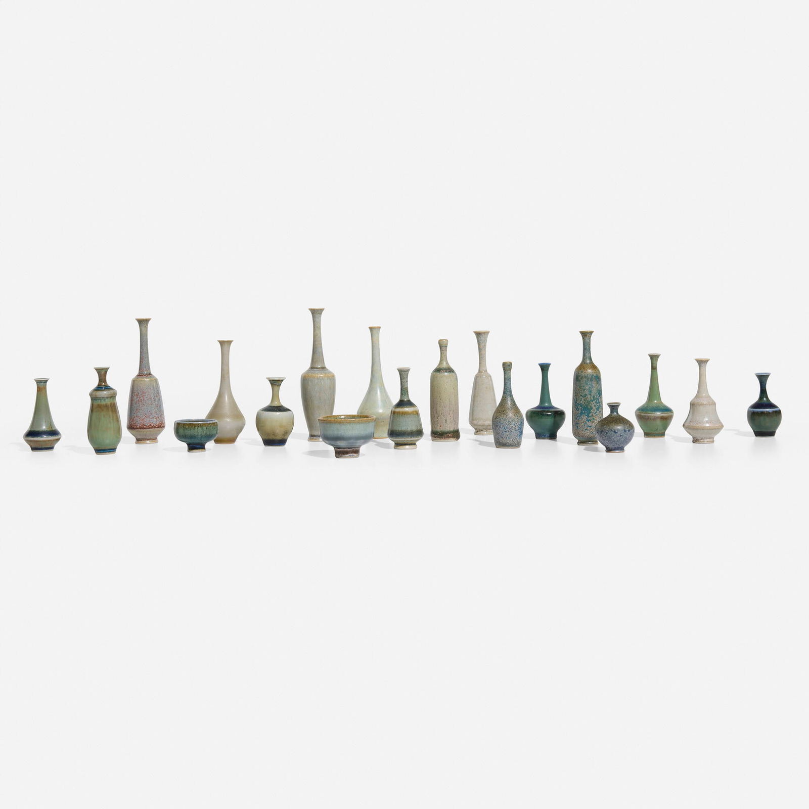 John Andersson, Collection of nineteen miniature vessels: John Andersson Collection of nineteen miniature vessels Hoganas Sweden, c. 1950 glazed stoneware largest: 3.5 h x 1 dia in (9 x 3 cm) smallest: 1.25 h x 1 dia in (3 x 3 cm) Incised signature and