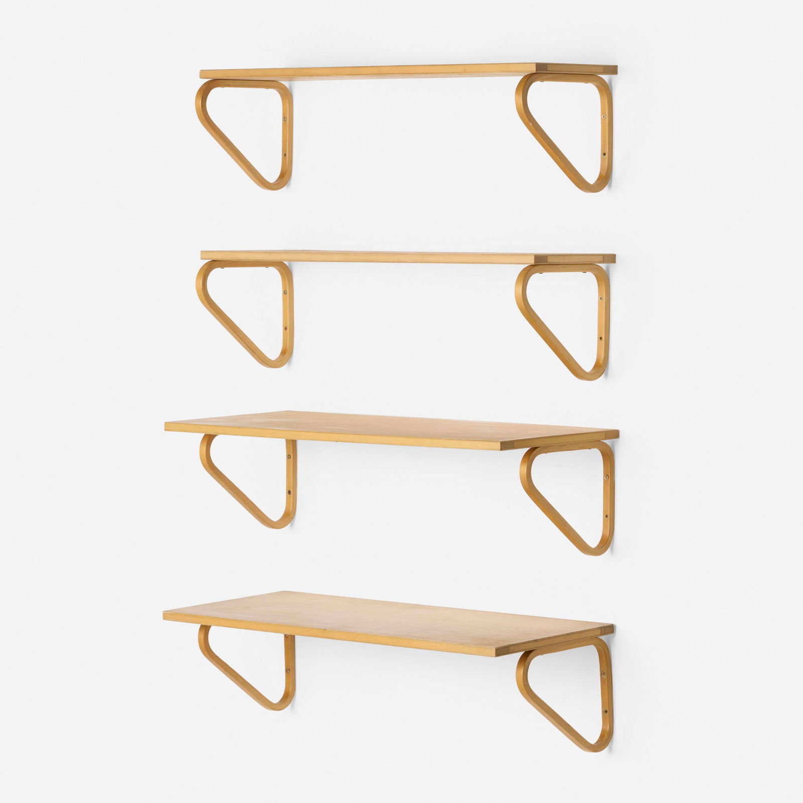 Alvar Aalto, Wall-mounted shelves model 112B, set of four: Alvar Aalto Wall-mounted shelves model 112B, set of four Artek Finland, 1933 / c. 1960 laminated birch 10 h x 35.5 w x 14 d in (25 x 90 x 36 cm) 10 h x 35.5 w x 9.75 d in (25 x 90 x 25 cm) Shelves