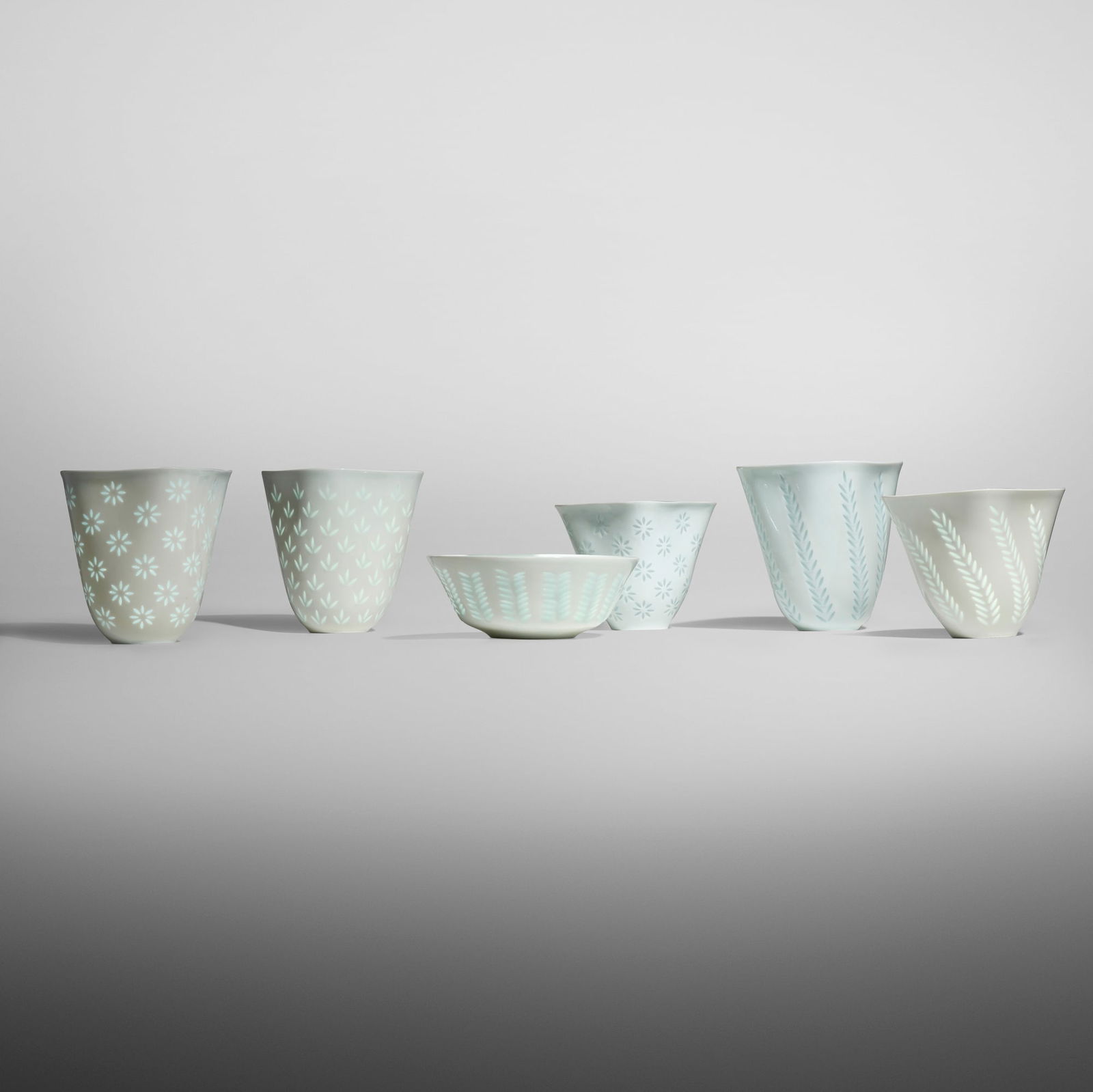 Friedl Holzer-Kjellberg, Collection of six vessels: Friedl Holzer-Kjellberg Collection of six vessels Arabia Austria/Finland, c. 1965 glazed rice porcelain largest: 6.75 h x 6.25 w x 6.25 d in (17 x 16 x 16 cm) smallest: 3 h x 8.125 dia in (8 x 21