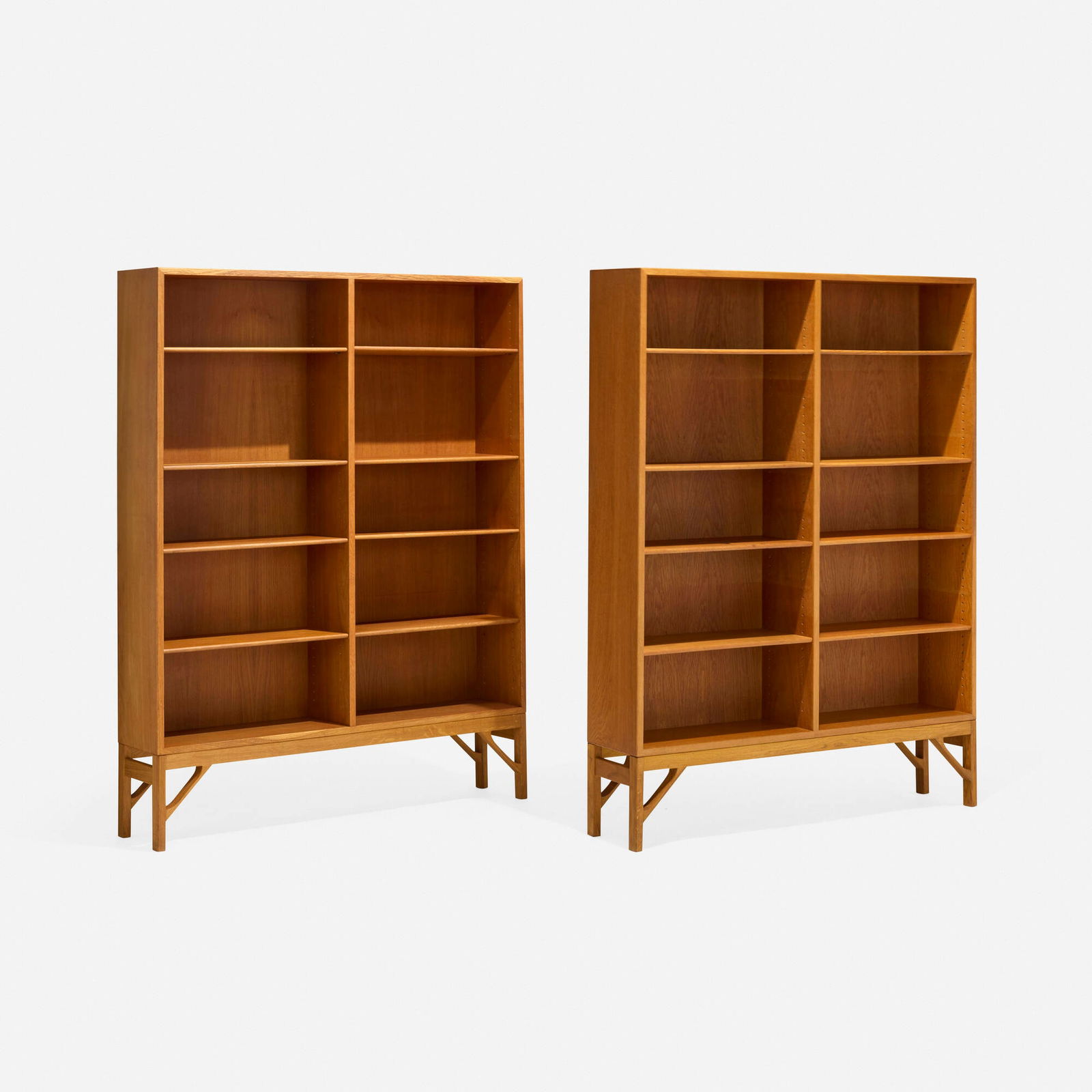 Borge Mogensen, Bookcases, pair: Borge Mogensen Bookcases, pair C.M. Madsens Fabrikker for FDB Mobler Denmark, c. 1945 oak 62.75 h x 48 w x 10.25 d in (159 x 122 x 26 cm) Bookcases each feature ten adjustable shelves. Stamped