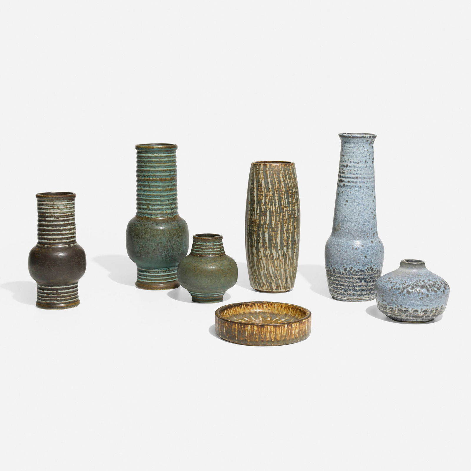 Gunnar Nylund, Collection of seven works: Gunnar Nylund Collection of seven works RorstrandSweden, c. 1965glazed stoneware tallest: 11.125 h x 3.875 dia in (28 x 10 cm) shortest: 1.25 h x 5.5 dia in (3 x 14 cm) Collection is