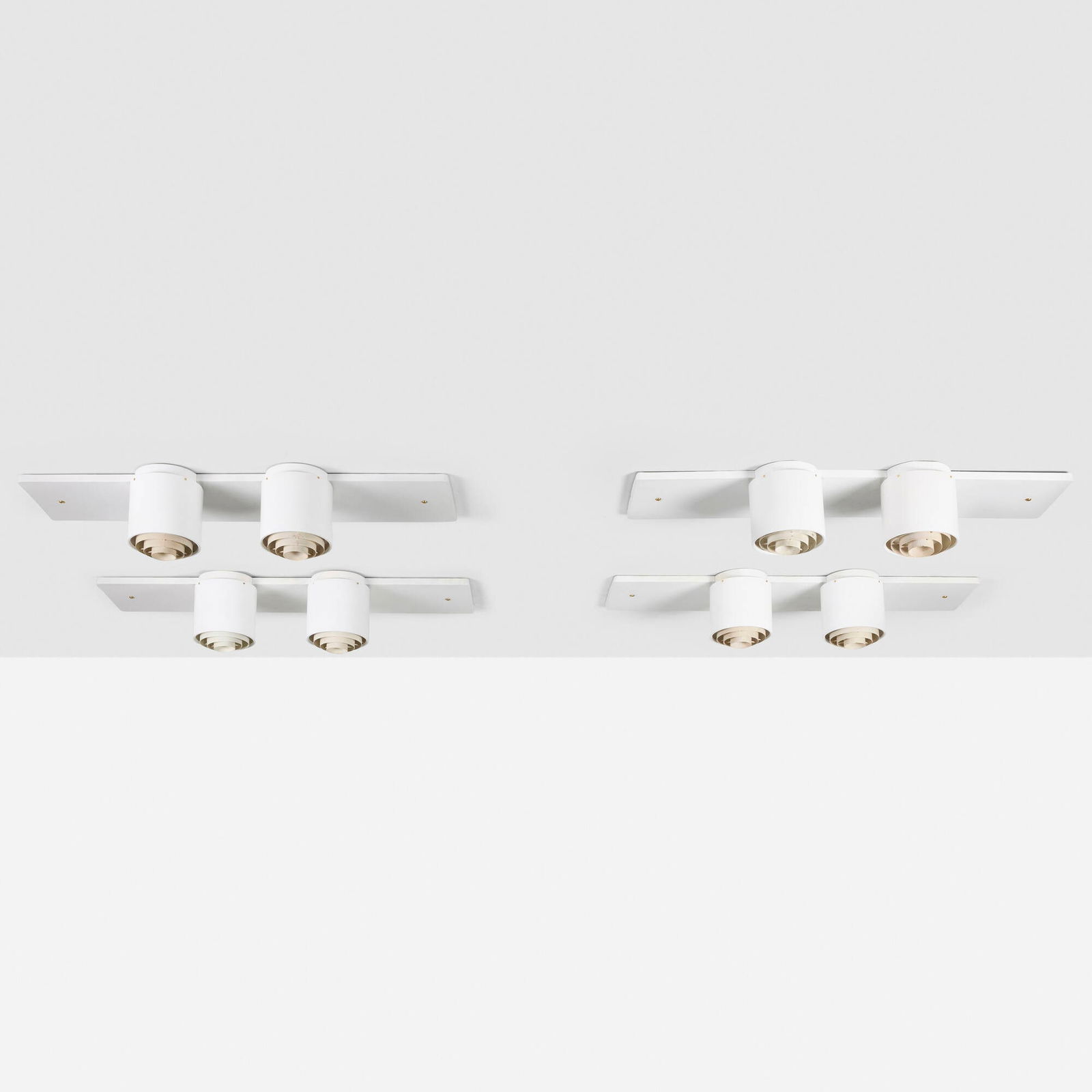 Alvar Aalto, Ceiling lamps, set of four: Alvar Aalto Ceiling lamps, set of four IdmanFinland, c. 1955painted aluminum and steel 8.25 h x 45.5 w x 13.5 d in (21 x 116 x 34 cm) Sets each feature two lamps. Stamped manufacturer's