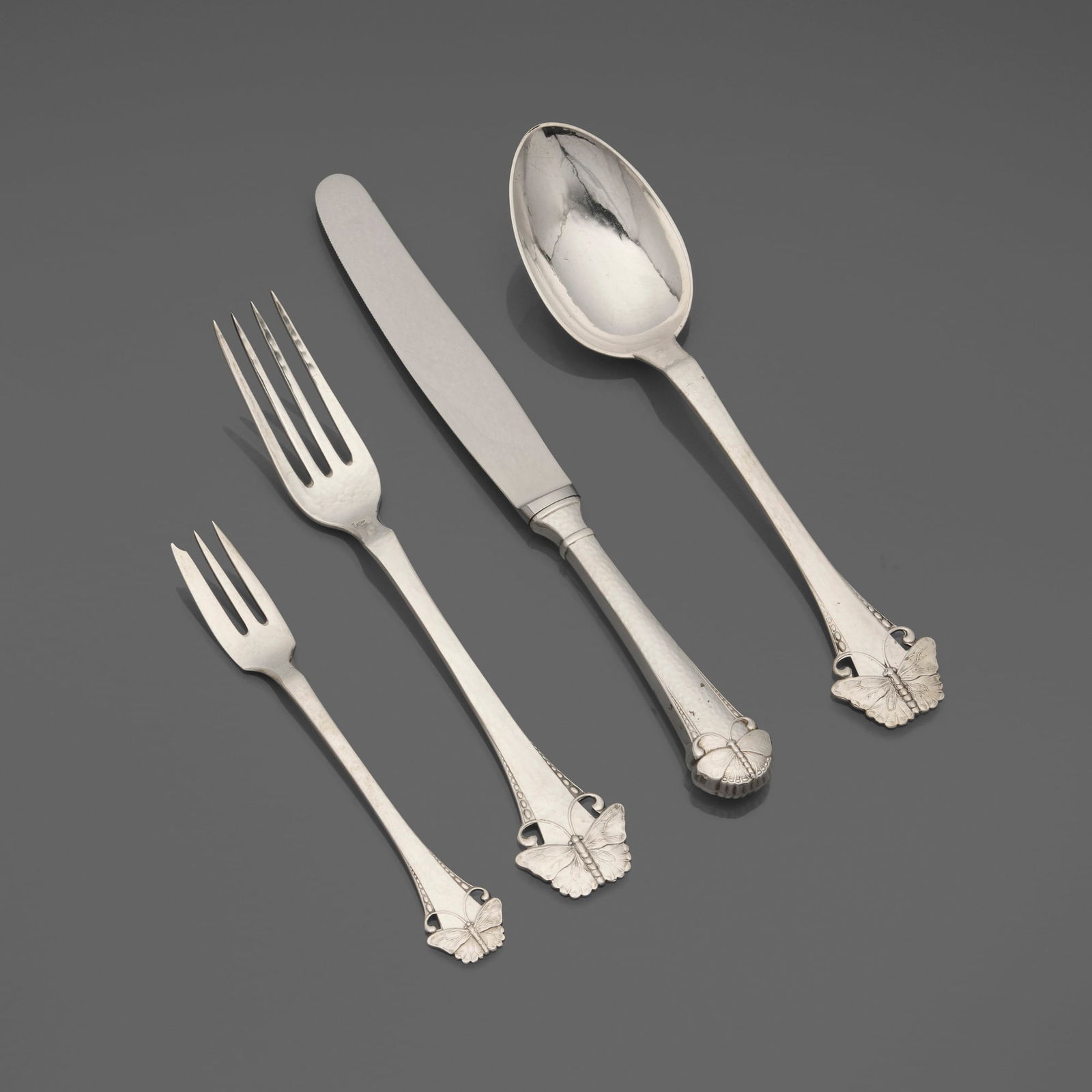 Christian Heise, Butterfly flatware set: Christian Heise Butterfly flatware set Frigast Denmark, c. 1919 .826 silver, .800 silver, stainless steel Complete five-piece set for six plus eight serving articles and set of twelve demitasse
