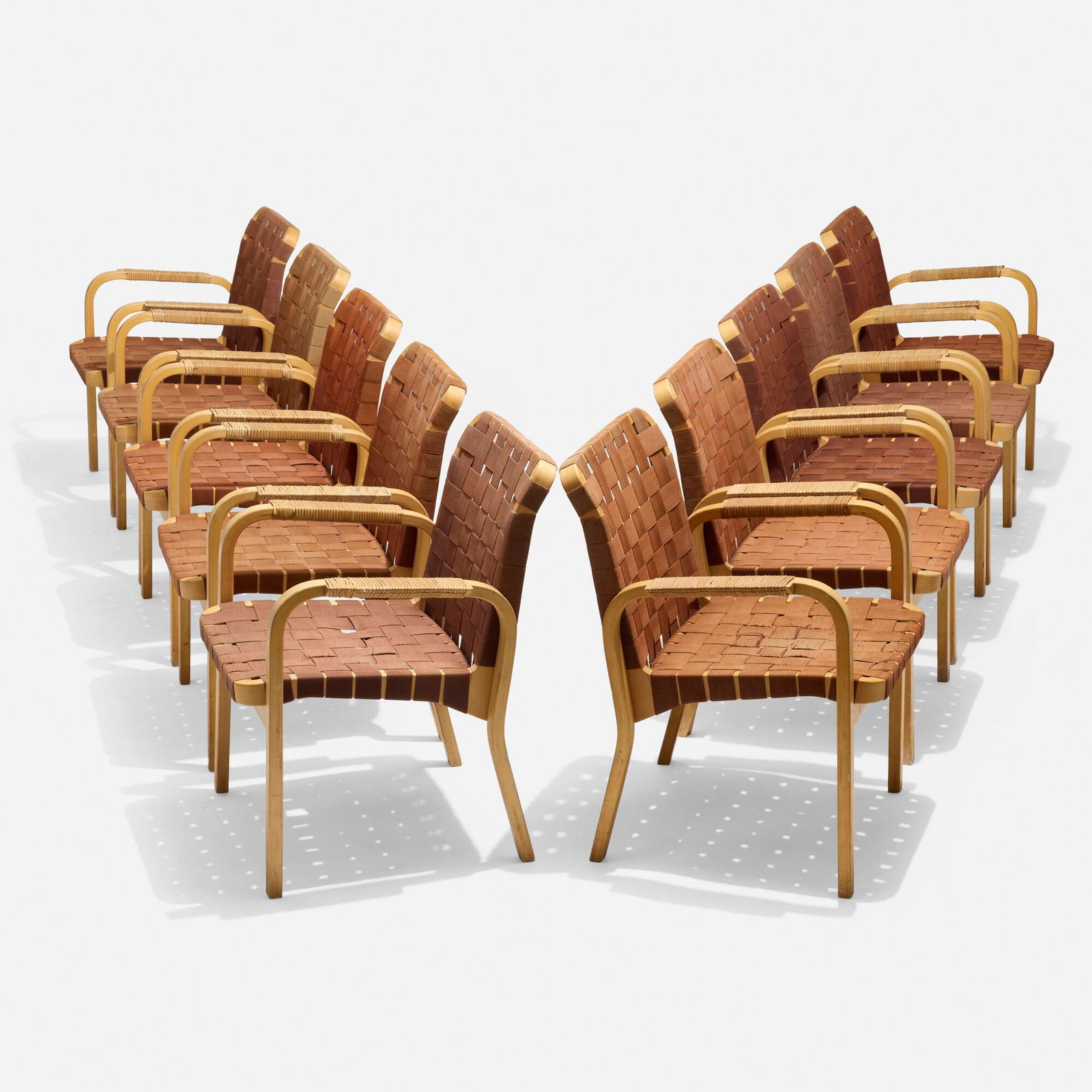 Alvar Aalto, Armchairs model 45, set of ten: Alvar Aalto Armchairs model 45, set of ten Artek Finland, 1947 / c. 1975 laminated birch, canvas webbing 31.25 h x 23.75 w x 25 d in (79 x 60 x 63 cm) Literature: Alvar Aalto: Designer, Lahti, pg.