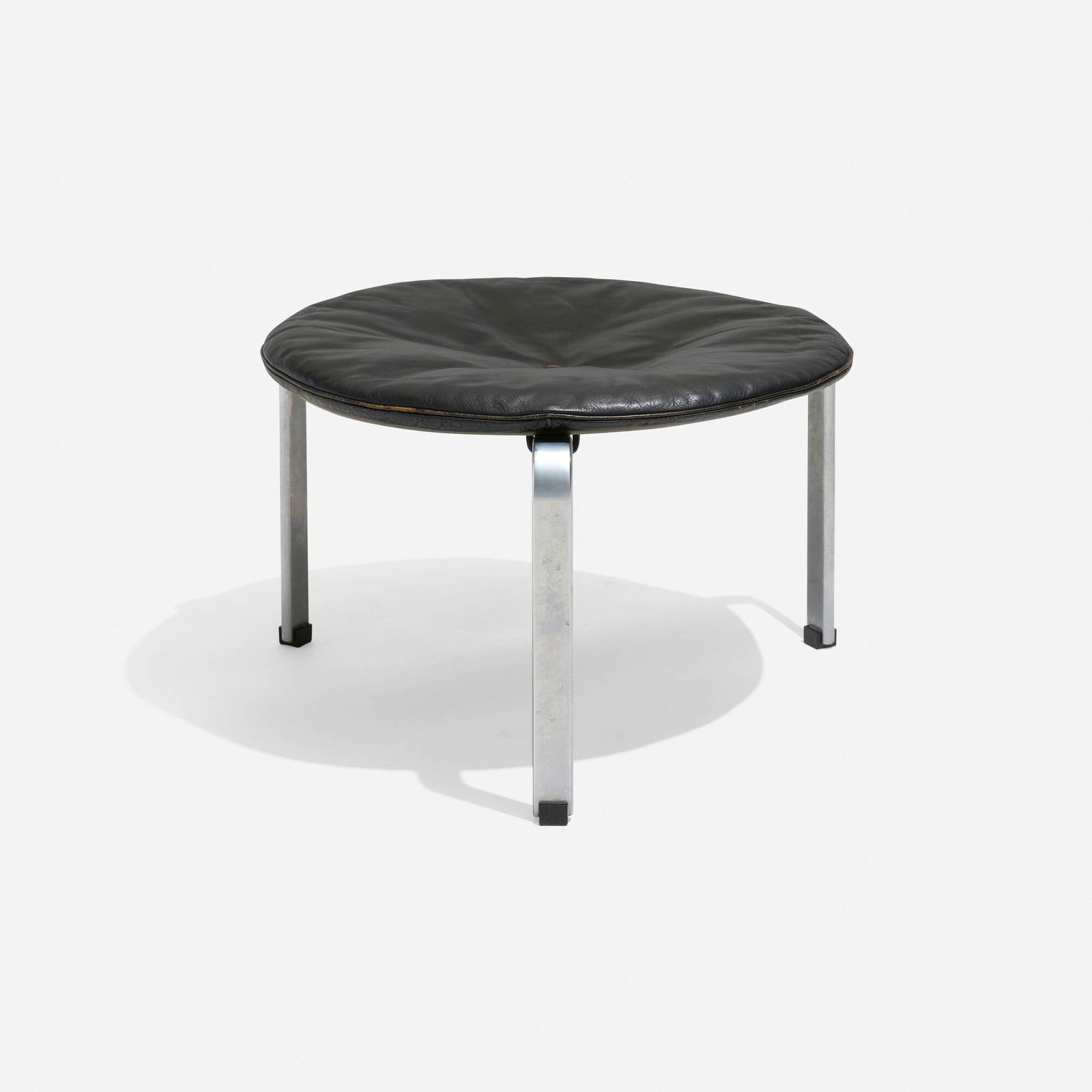 Poul Kjaerholm, PK 33 stool: Poul Kjaerholm PK 33 stool E. Kold Christensen Denmark, 1959 / c. 1980 leather upholstery, matte chrome-plated steel, lacquered wood, plastic 13.75 h x 23.5 dia in (35 x 60 cm) Impressed