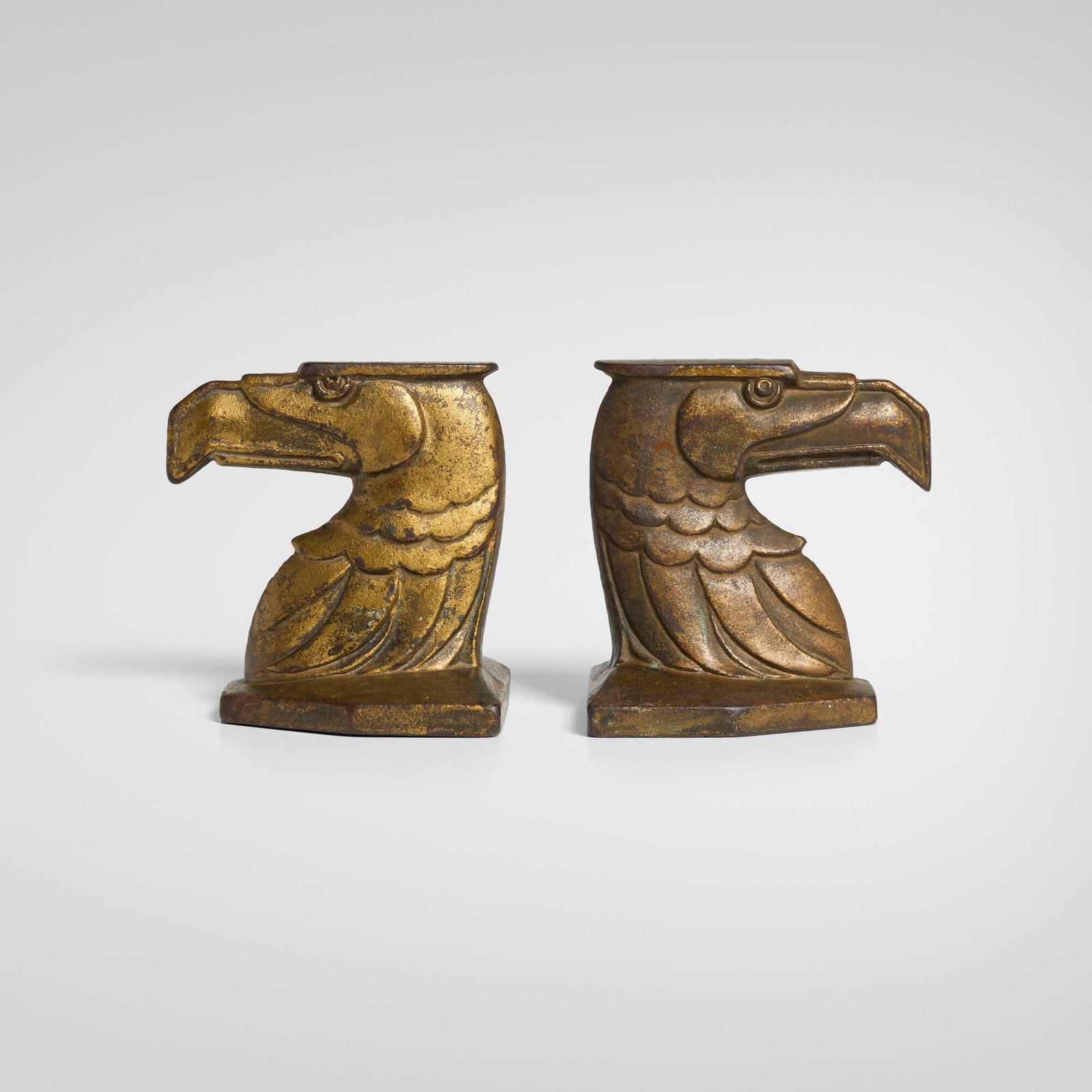American bald eagle head bookends, pair: American bald eagle head bookends, pair c. 1950gilt iron 3.5 h x 3.5 w x 2.75 d in (9 x 9 x 7 cm) Provenance: Private Collection This work will ship from Chicago, Illinois.