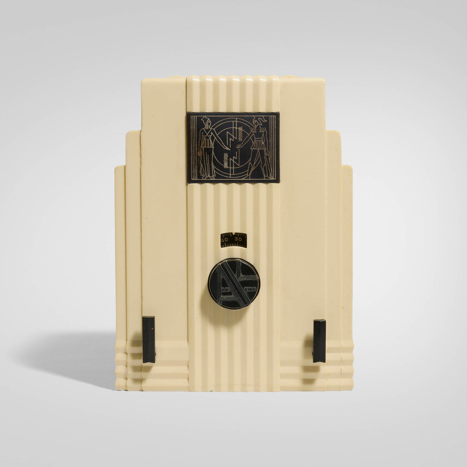 Harold Van Doren and John G. Rideout, Air King radio, model 52 with Egyptian insert: Harold Van Doren and John G. Rideout Air King radio, model 52 with Egyptian insert Air King Products Co.USA, 1933Bakelite, enameled brass, fabric 11.75 h x 8.75 w x 7.5 d in (30 x 22 x 19 cm)