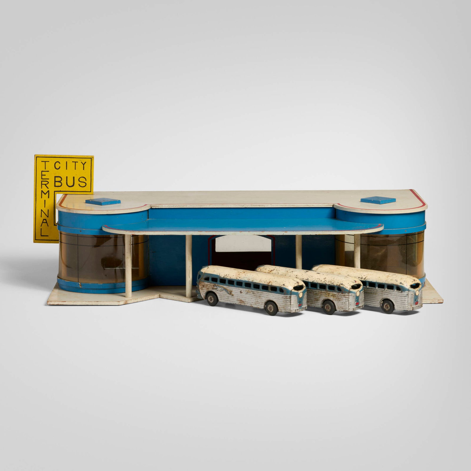 L.B. Goetschius Woodcraft Company, Ell-Bee City Bus Terminal toy: L.B. Goetschius Woodcraft Company Ell-Bee City Bus Terminal toy USA, c. 1939painted wood, plastic, rubber, cast iron 9.5 h x 30.5 w x 19 d in (24 x 77 x 48 cm) Partial decal manufacturer's lab