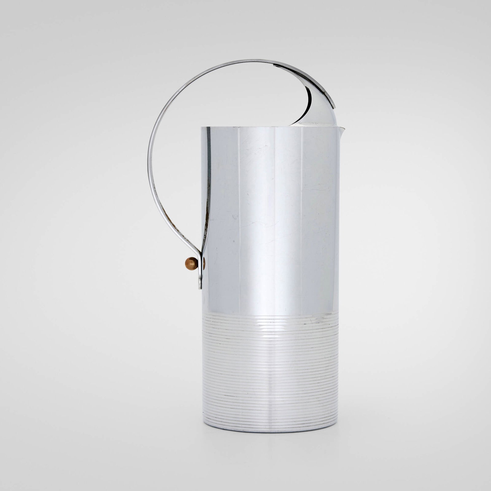 Norman Bel Geddes, Pitcher: Norman Bel Geddes Pitcher Manning Bowman & Co.USA, c. 1935chrome-plated metal, brass 9.5 h x 5 w x 3.75 d in (24 x 13 x 10 cm) Impressed manufacturer's mark to underside 'Manning Bowman