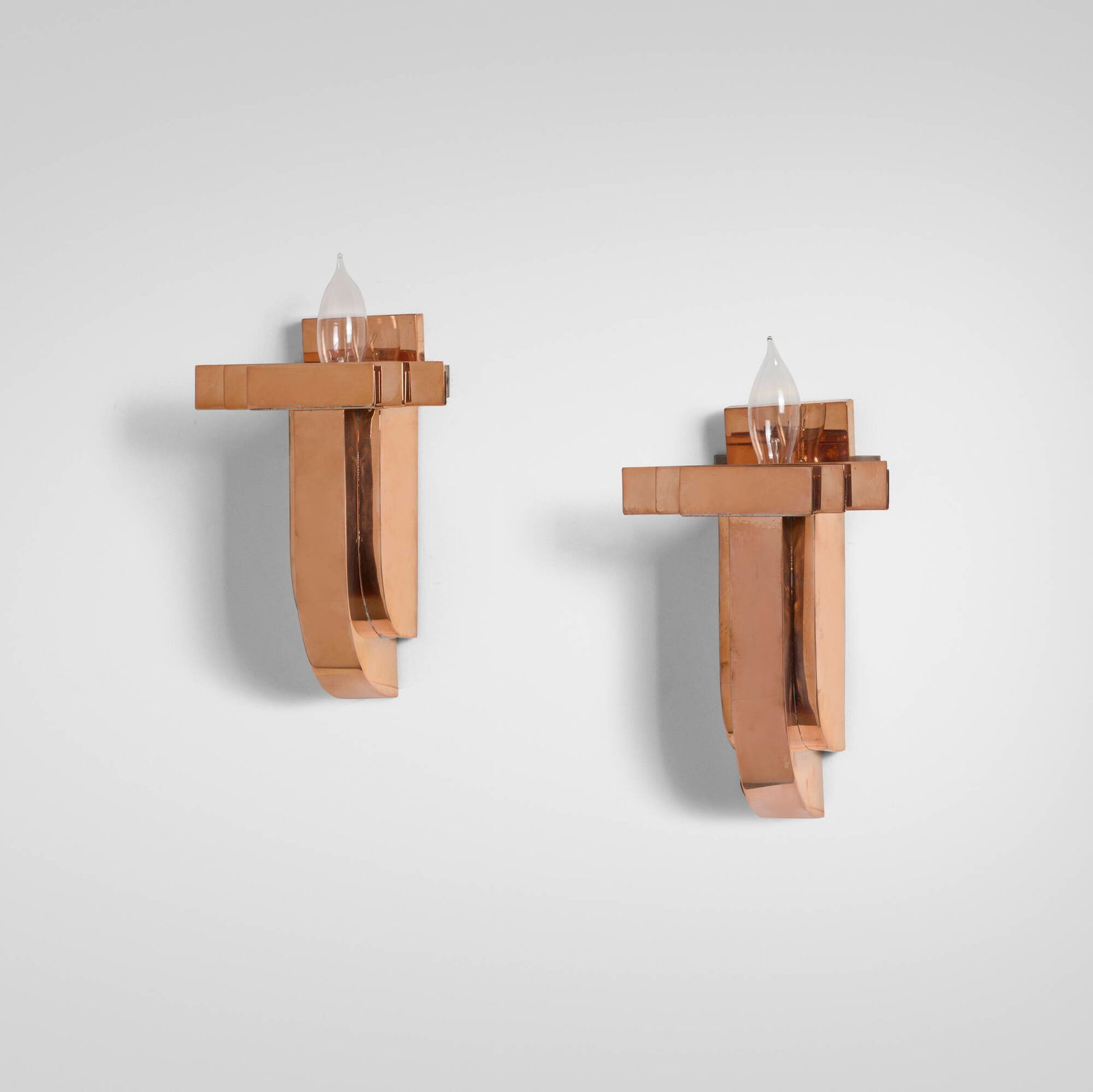 Machine Age, Sconces, pair: Machine Age Sconces, pair USA, c. 1930copper 8.75 h x 6 w x 3.875 d in (22 x 15 x 10 cm) Provenance: Private Collection This work will ship from Chicago, I