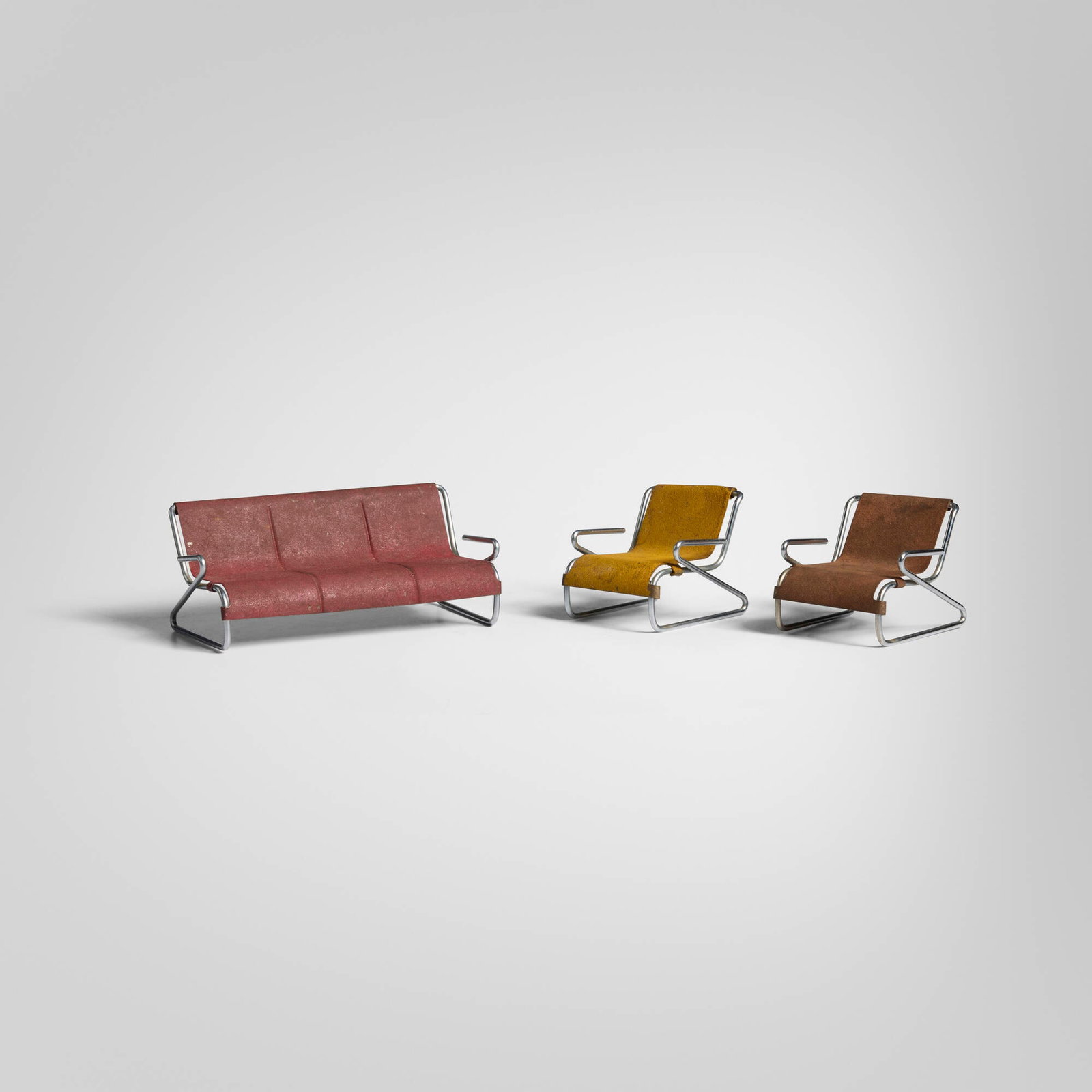 Modern, Collection of miniature furniture: Modern Collection of miniature furniture c. 1940 steel, patinated metal 2.5 h x 6.25 w x 3 d in (6 x 16 x 8 cm) 2.5 h x 2.75 w x 3 d in (6 x 7 x 8 cm) Collection is comprised of two lounge chairs