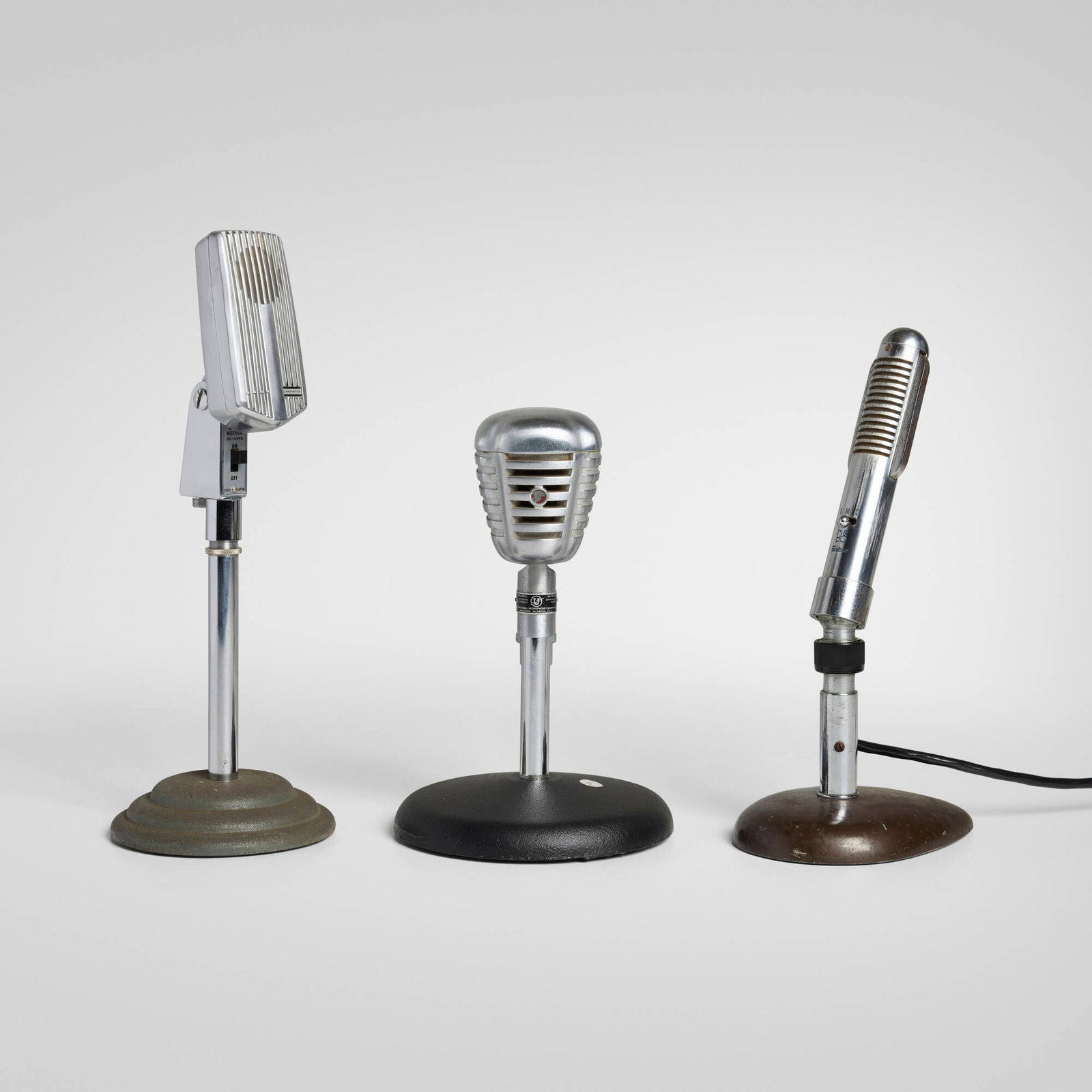 Modern, Collection of three table microphones: Modern Collection of three table microphones c. 1945-1965 chrome-plated metal, stainless steel, crackle-lacquered steel 12.5 h x 4.75 dia in (32 x 12 cm) 11.25 h x 5.5 w x 4 d in (29 x 14 x 10 cm)