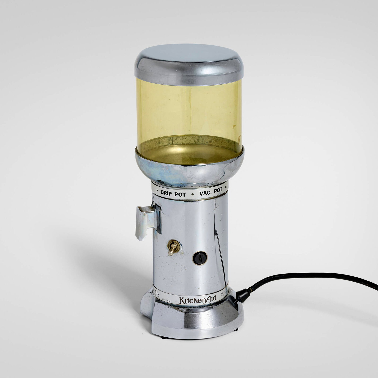 Egmont Arens, Kitchenaid coffee mill, model A-10: Egmont Arens Kitchenaid coffee mill, model A-10 The Hobart MFG. Co. USA, c. 1935 chrome-plated steel and brass, acrylic 12.875 h x 5 dia in (33 x 13 cm) Screen printed manufacturer's mark to base