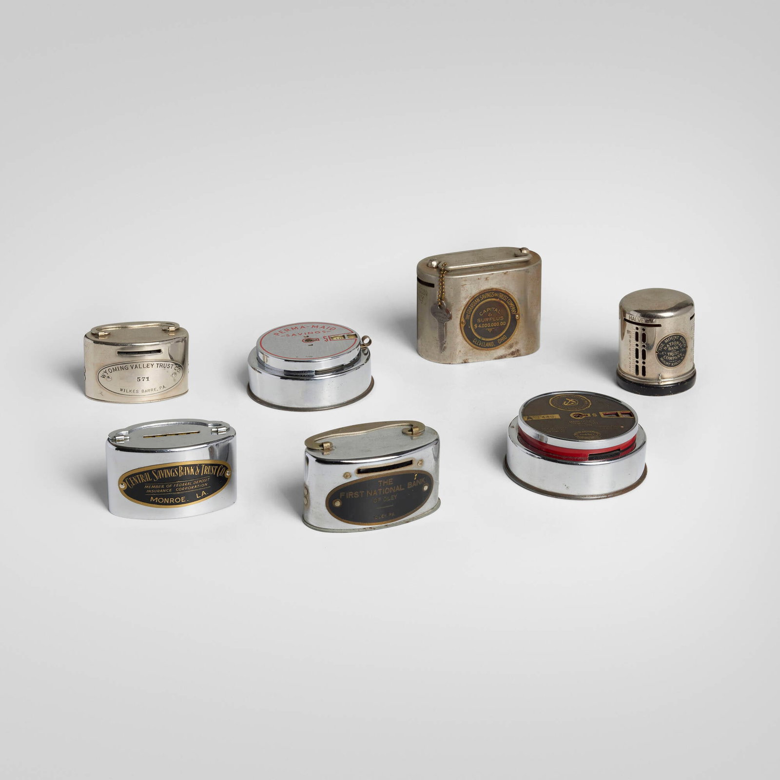 Collection of seven coin banks (1 of 6)
