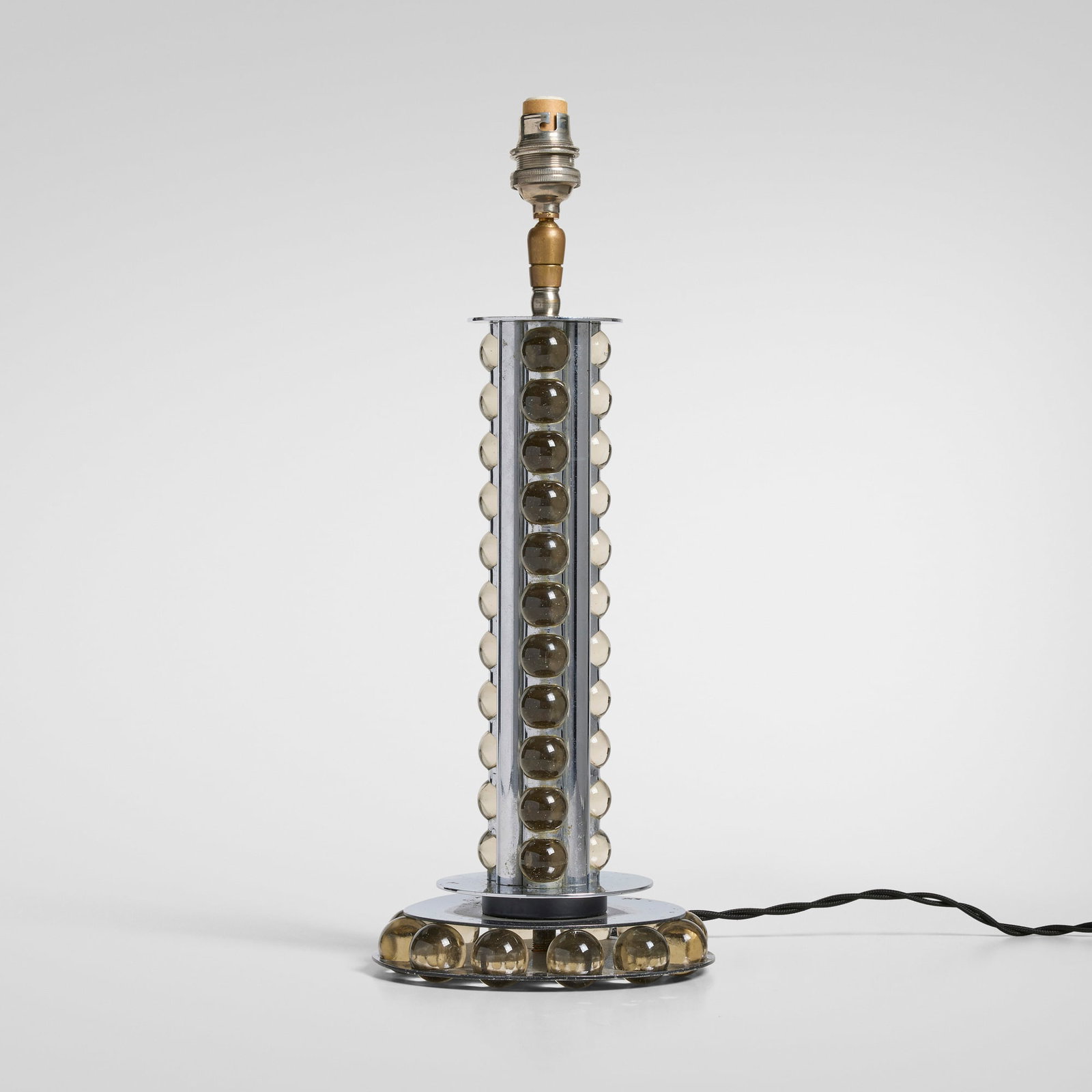 Machine Age, Table lamp base: Machine Age Table lamp base USA, c. 1940glass, chrome-plated steel 15.25 h x 5.75 dia in (39 x 15 cm) Provenance: Private Collection This work will ship fr