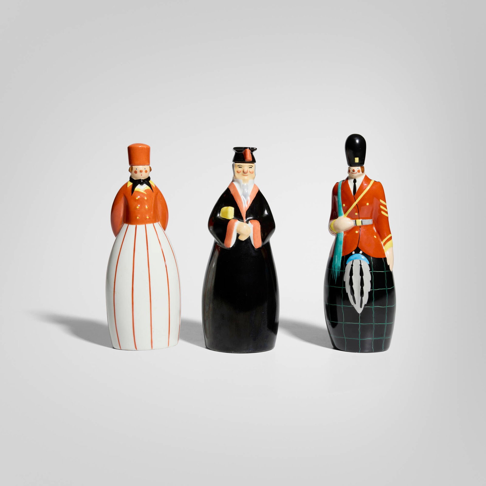 Robj, Figural stoppered bottles, set of three: Robj Figural stoppered bottles, set of three France, c. 1930 glazed porcelain 10.75 h x 3.5 w x 3 d in (27 x 9 x 8 cm) 10 h x 3.5 w x 2.75 d in (25 x 9 x 7 cm) 10 h x 3.75 w x 3.5 d in (25 x 10 x 9