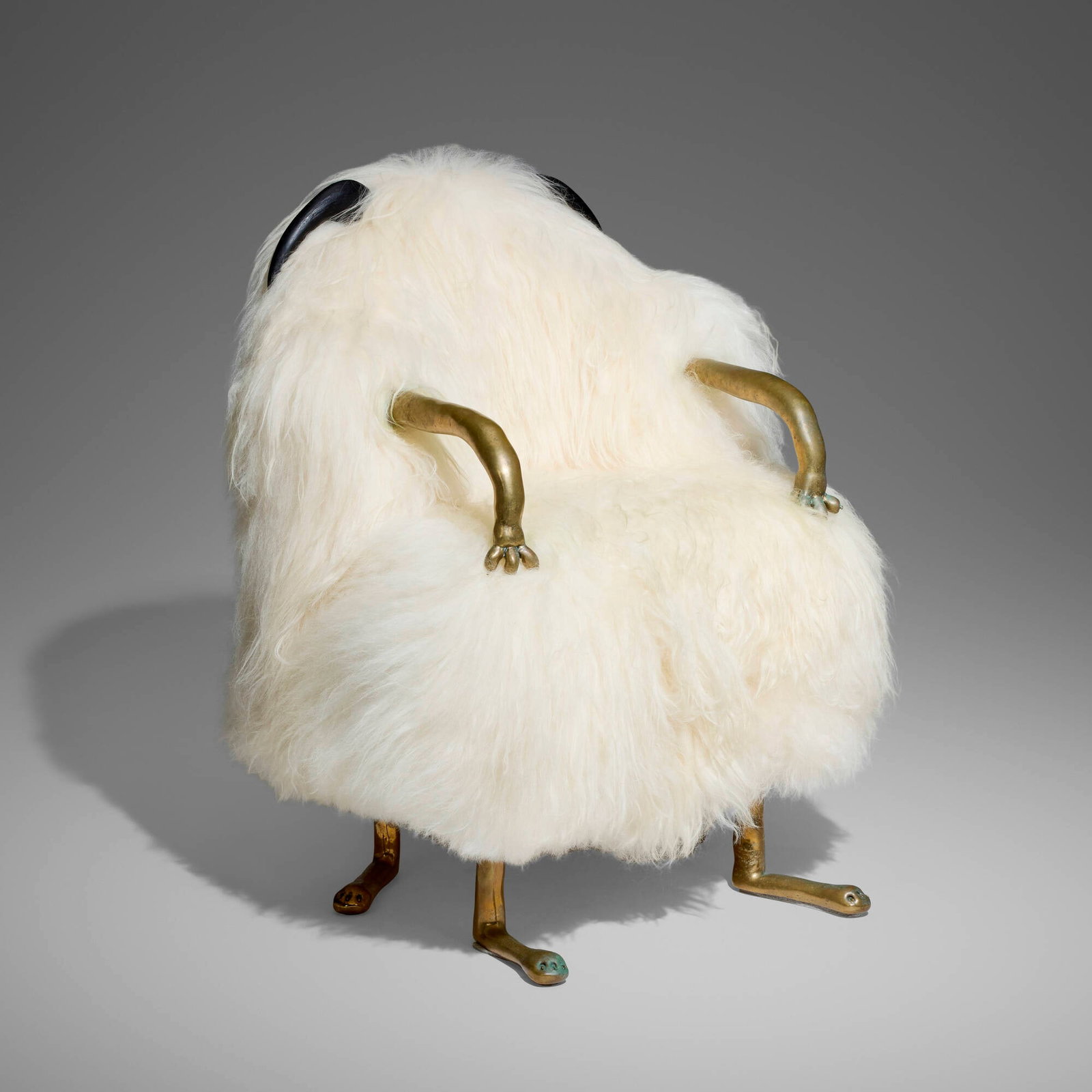 The Haas Brothers (Nikolai and Simon Haas), Custom and Unique Beast vanity chair: The Haas Brothers (Nikolai and Simon Haas) Custom and Unique Beast vanity chair USA, 2019 Icelandic sheepskin, cast brass, carved ebony 34 h x 28 w x 26.5 d in (86 x 71 x 67 cm) Plaque with