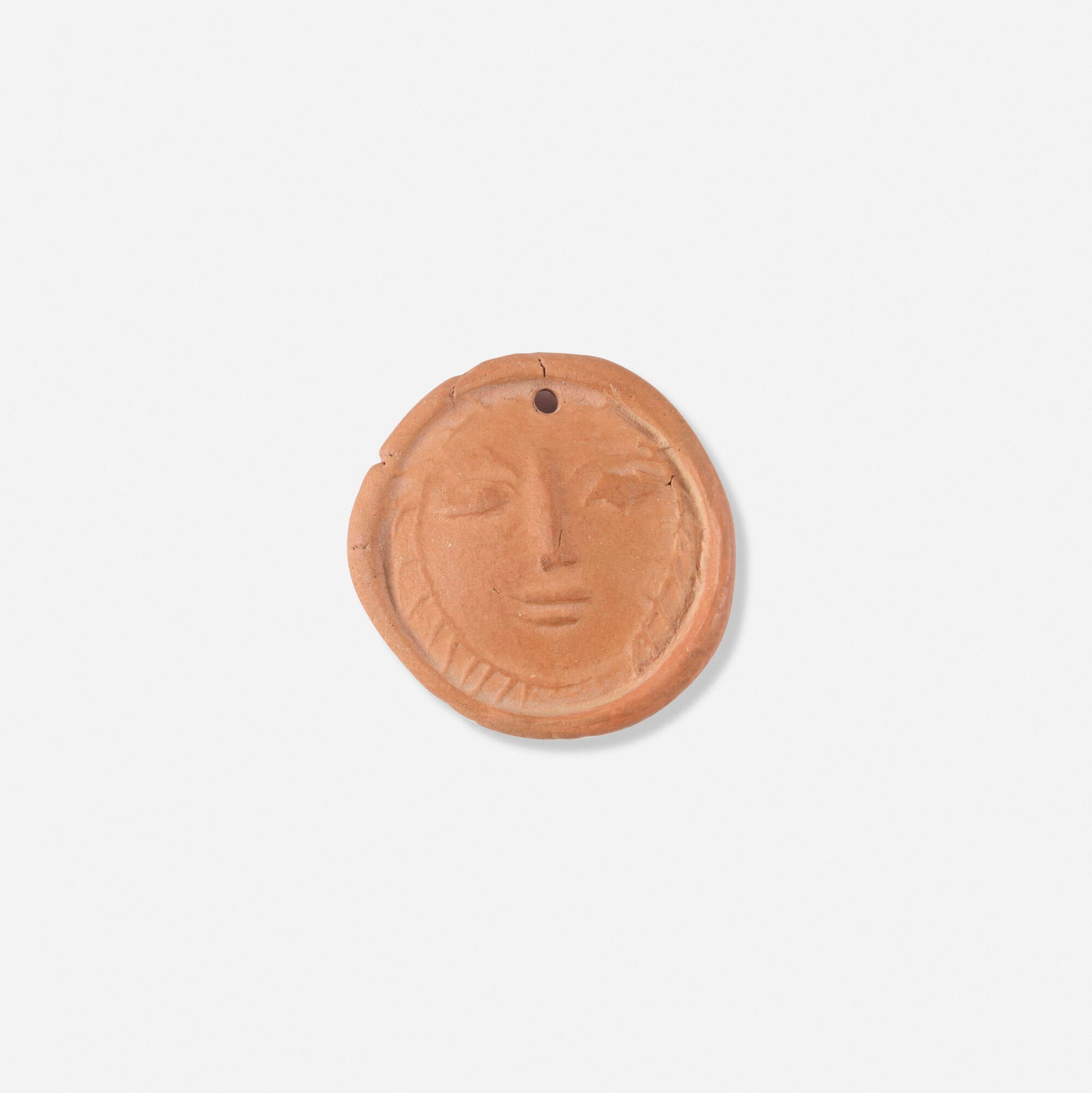 Pablo Picasso, Visage de femme: Pablo Picasso Visage de femme 1949 red earthenware 0.375 d x 1.5 dia in (1 x 4 cm) Impressed studio marks to underside 'Madoura Empreinte Originale de Picasso'. This work is from the edition of