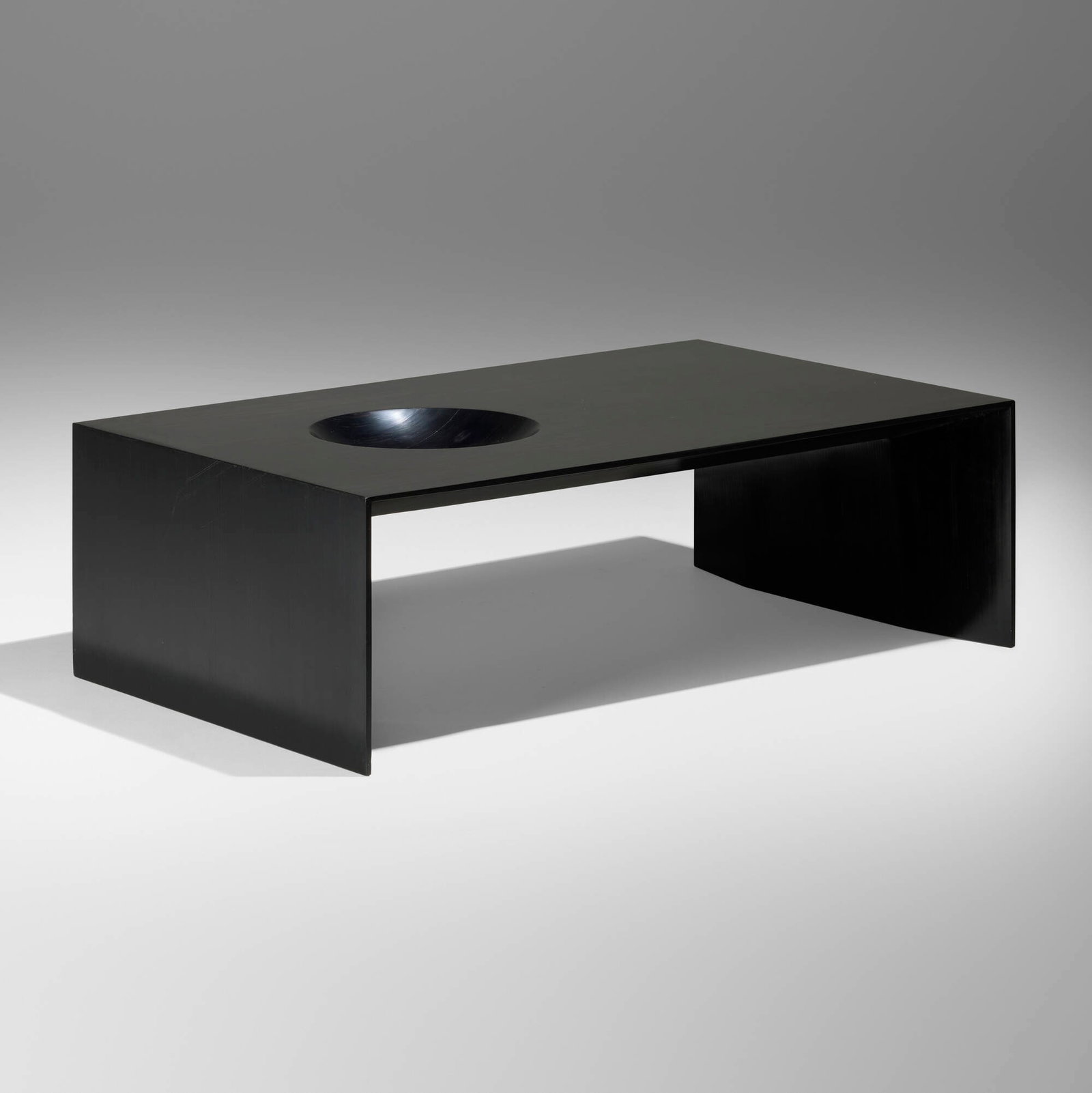 Sebastian Errazuriz, Bowl coffee table: Sebastian Errazuriz Bowl coffee table Chile, c. 2015 carved plywood 15 h x 48 w x 29.75 d in (38 x 122 x 76 cm) Provenance: Cristina Grajales, New York This work will ship from Lambertville, New