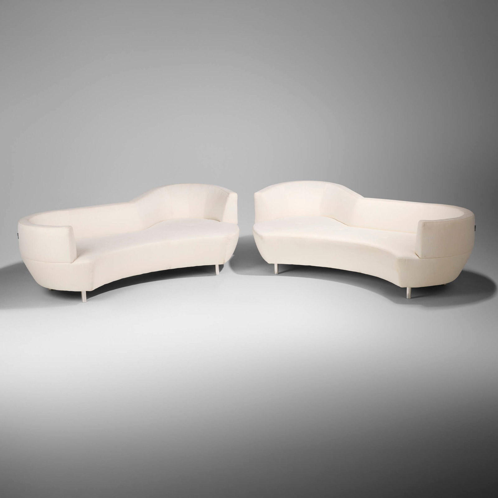 Gabriele Assmann & Alfred Kleene, Tangram sofas, set of two: Gabriele Assmann & Alfred Kleene Tangram sofas, set of two Cierre Imbottiti Italy, late 20th century upholstery 29.5 h x 100 w x 56 d in (75 x 254 x 142 cm) Fabric distributor's label to side of