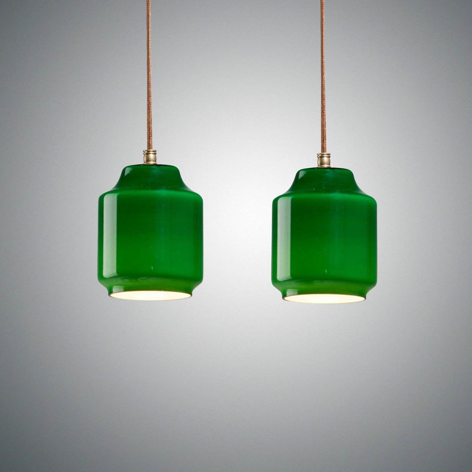 Massimo Vignelli, Pendant lamps, pair: Massimo Vignelli Pendant lamps, pair Venini Italy, c. 1955 incamiciato glass, braided textile cord 48 h x 5 dia in (122 x 13 cm) 43 h x 5 dia in (109 x 13 cm) This work will ship from Lambertville,