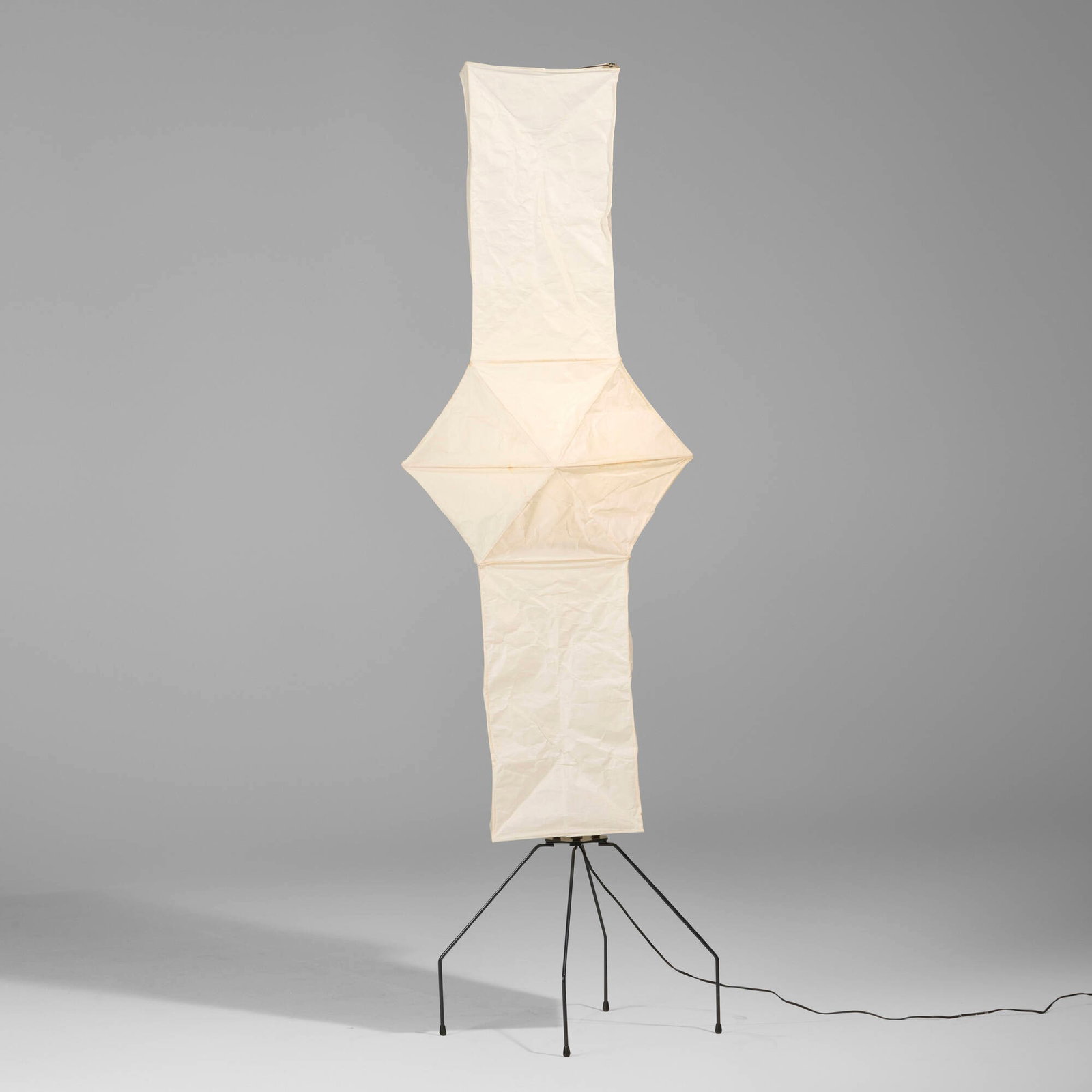 Isamu Noguchi, Akari light sculpture, model UF4-L5: Isamu Noguchi Akari light sculpture, model UF4-L5 Ozeki & Co., Ltd. USA, 1976 / produced later washi paper, enameled steel 77.5 h x 23 w x 23 d in (197 x 58 x 58 cm) Signed to top exterior
