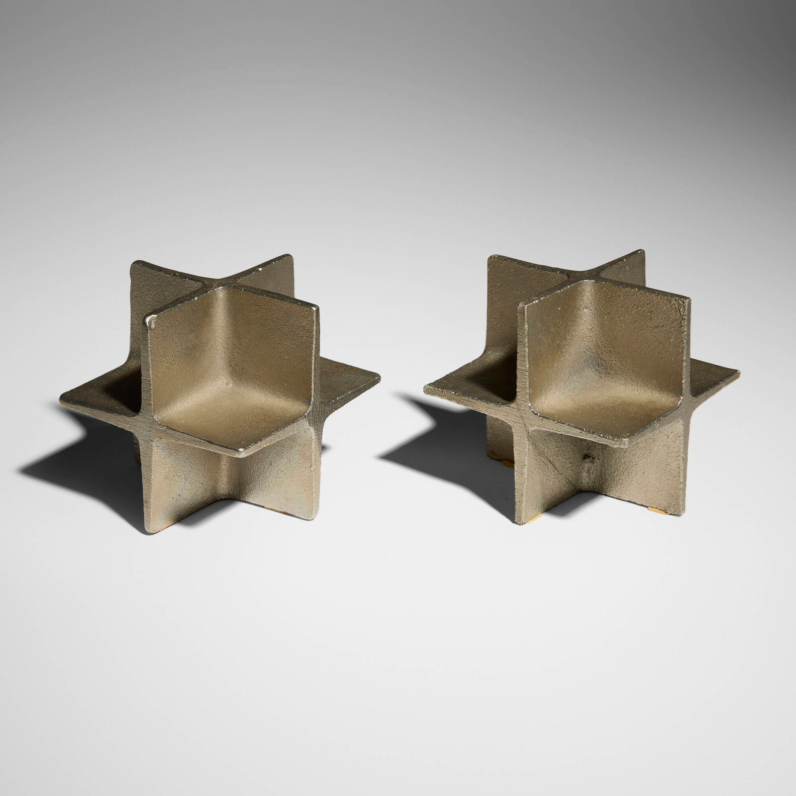 Carl Aubock III, Bookends model 5403, pair: Carl Aubock III Bookends model 5403, pair Werkstatte Carl Aubock Austria, c. 1975 nickel-plated iron 4 h x 4 w x 4 d in (10 x 10 x 10 cm) This work will ship from Chicago, Illinois.