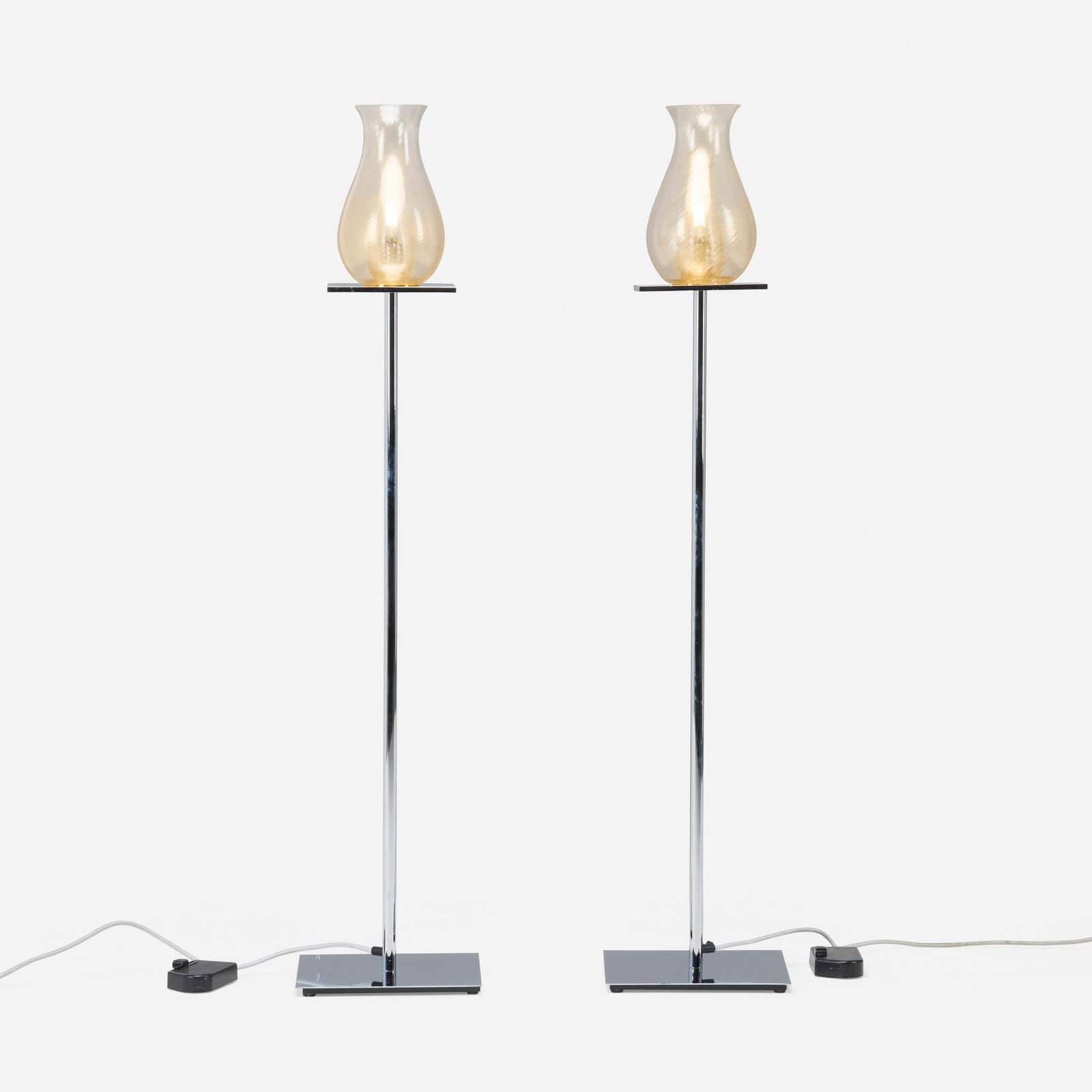 Philippe Starck, Floor lamps for the Clift Hotel, pair: Philippe Starck Floor lamps for the Clift Hotel, pair Andromeda International France, c. 2001 chrome-plated steel, clear glass with aventurine bands 49 h x 10.25 w x 10.25 d in (124 x 26 x 26 cm)