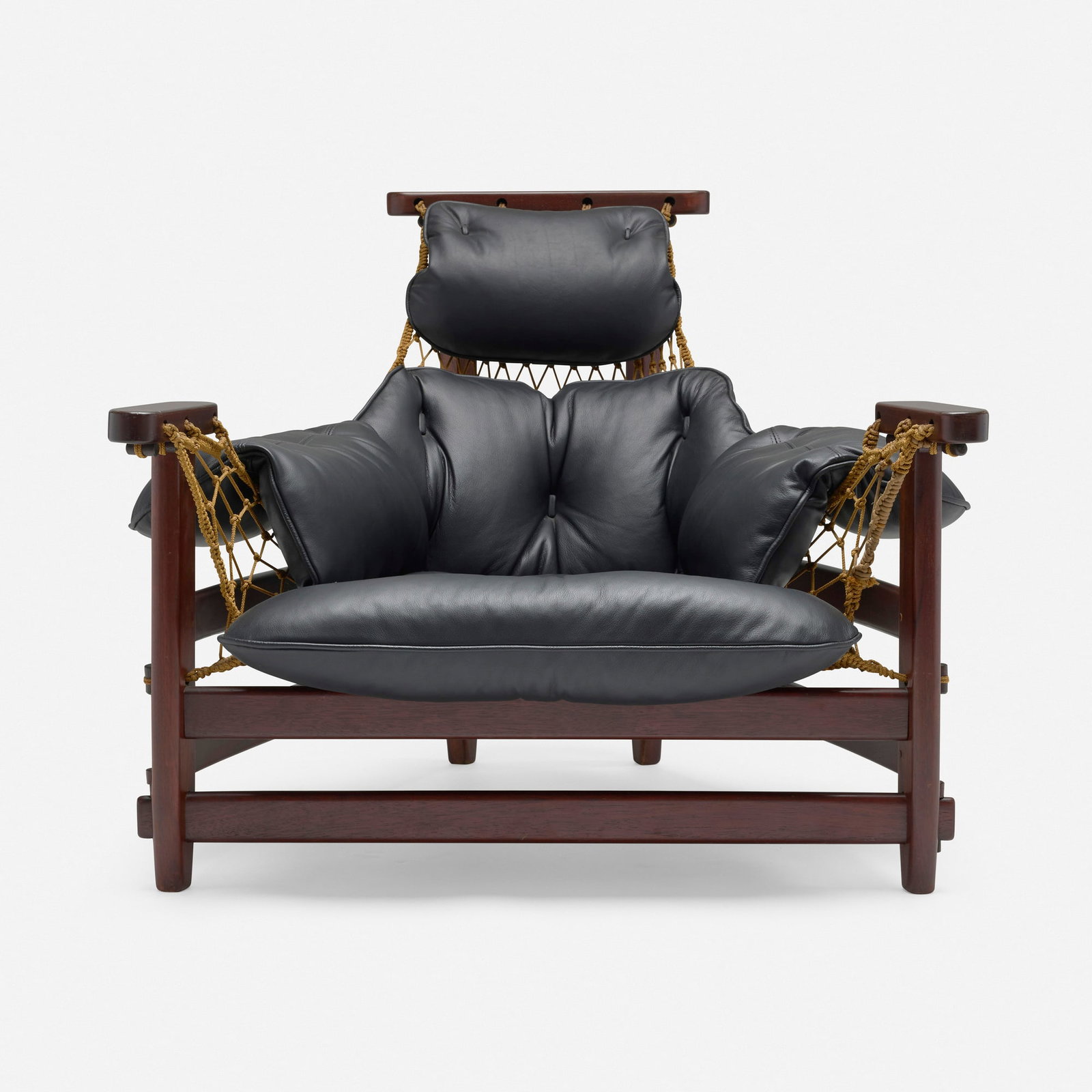 Jean Gillon, Lounge chair: Jean Gillon Lounge chair Italma Wood Art Brazil, 1968 mahogany, leather upholstery, cord 32.25 h x 38 w x 41 d in (82 x 97 x 104 cm) This work will ship from Chicago, Illinois.