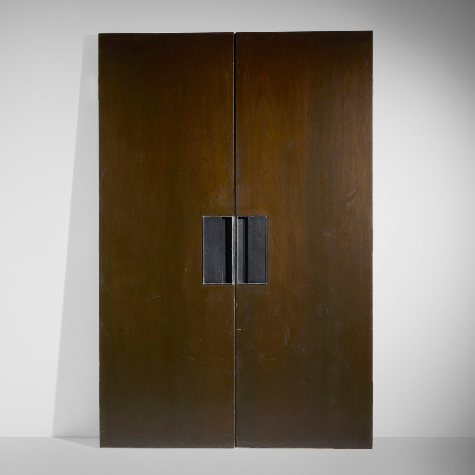 Maria Bergson, Custom Board Room doors from the Cafritz Foundation, Washington, D.C., pair: Maria Bergson Custom Board Room doors from the Morris & Gwendolyn Cafritz Foundation, Washington, D.C., pair Austria/USA, c. 1965 mahogany, chrome-plated steel, leather 91.5 h x 30 w x 2.125 d in