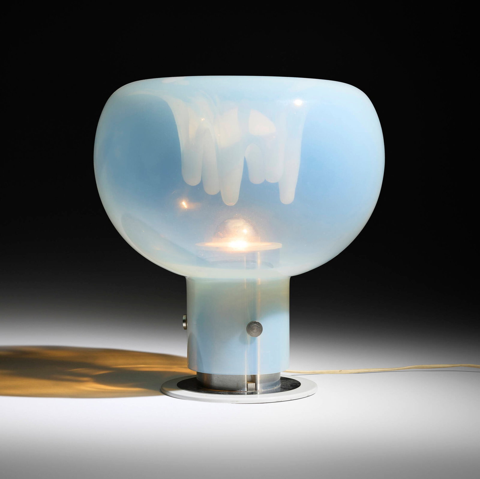 Toni Zuccheri, Table lamp: Toni Zuccheri Table lamp VeArt Italy, c. 1970 glass, chrome-plated and enameled steel 15.5 h x 14 dia in (39 x 36 cm) Provenance: Collection of Lori Ulanova and Robert Wit