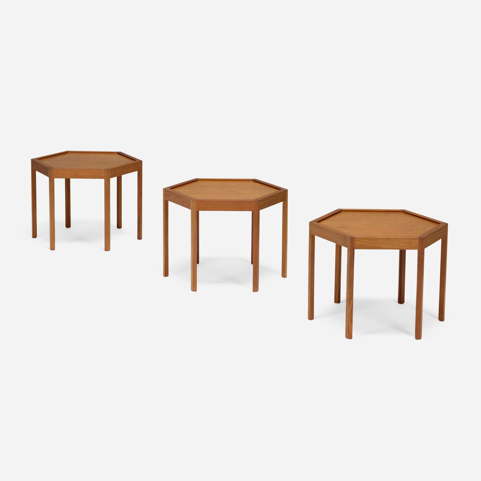 Hans C. Andersen, Occasional tables, set of three: Hans C. Andersen Occasional tables, set of three Artex Denmark, c. 1965 teak each: 14.25 h x 16.75 w x 9.125 d in (36 x 43 x 23 cm) Branded manufacturer's mark to underside of each example 'Made
