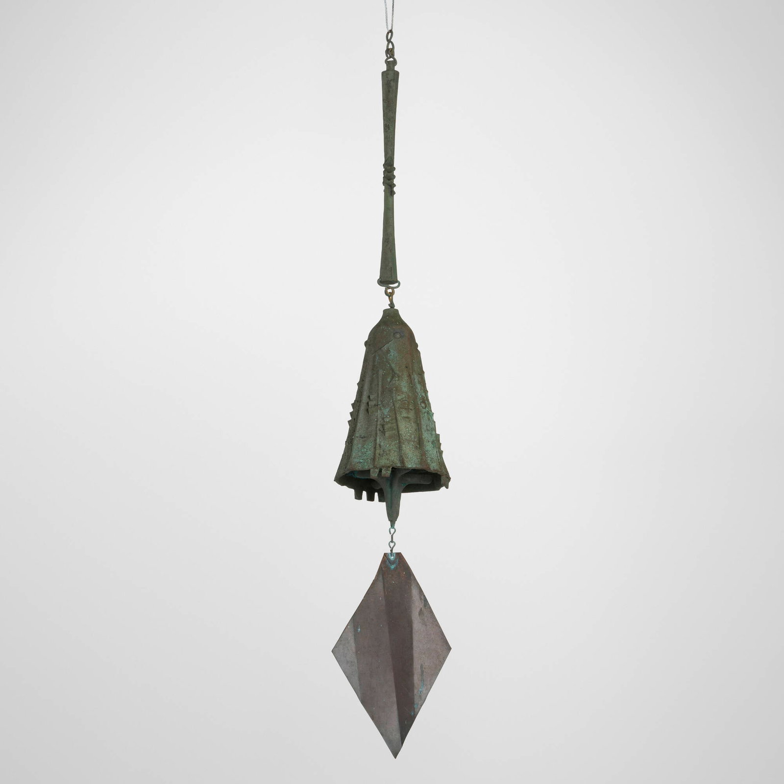 Paolo Soleri, Windbell: Paolo Soleri Windbell Italy/USA, c. 1975 patinated bronze, copper 36 h x 6.25 dia in (91 x 16 cm) Cast artist's cipher to body. This work will ship from Lambertville, New Jersey.