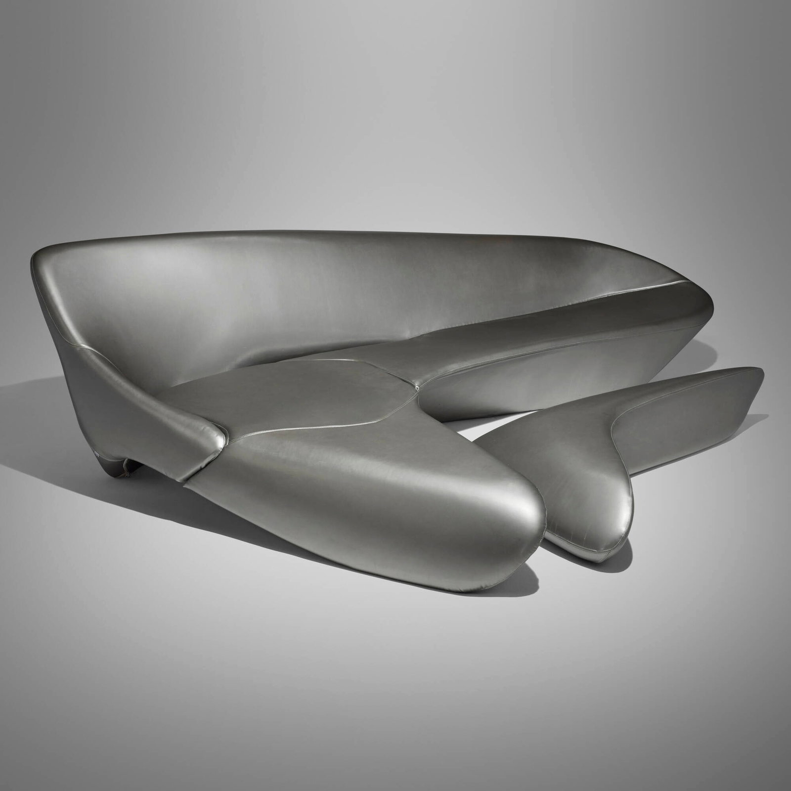 Zaha Hadid, Moon System sofa and ottoman: Zaha Hadid Moon System sofa and ottoman B&B Italia United Kingdom / Italy, 2007 vinyl upholstery over polyurethane foam sofa: 33 h x 111 w x 80 d in (84 x 282 x 203 cm) ottoman: 11 h x 60 w x 36 d in