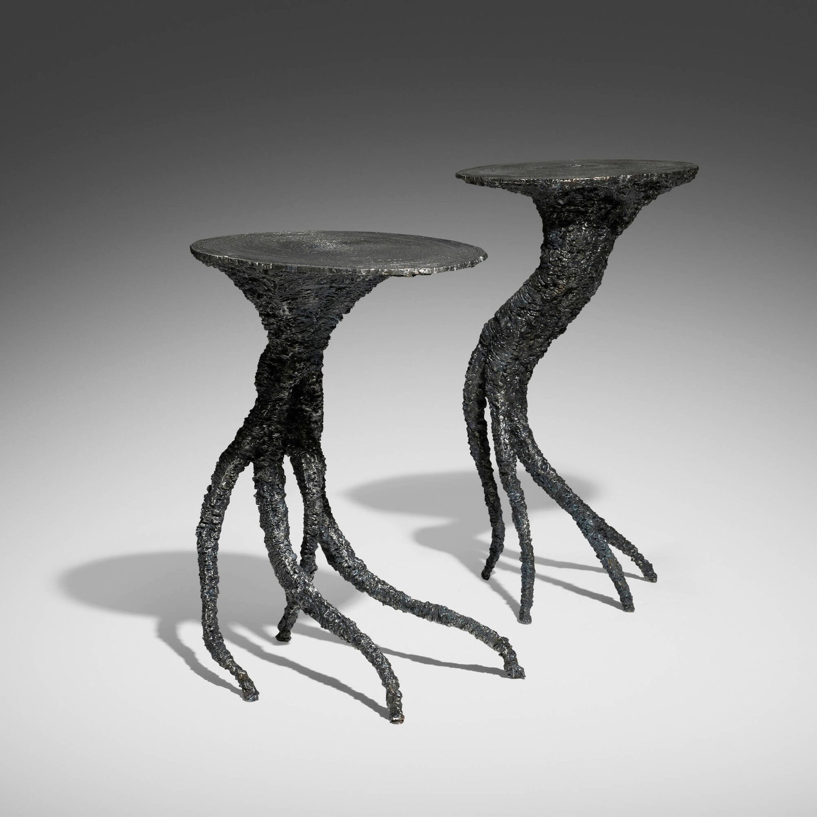 James Bearden, Medusa occasional tables, set of two: James Bearden Medusa occasional tables, set of two USA, 2025 plasma-carved steel with metallic polywash finish 23.25 h x 12.75 w x 11 d in (59 x 32 x 28 cm) 21.25 h x 16 w x 11.5 d in (54 x 41 x 29