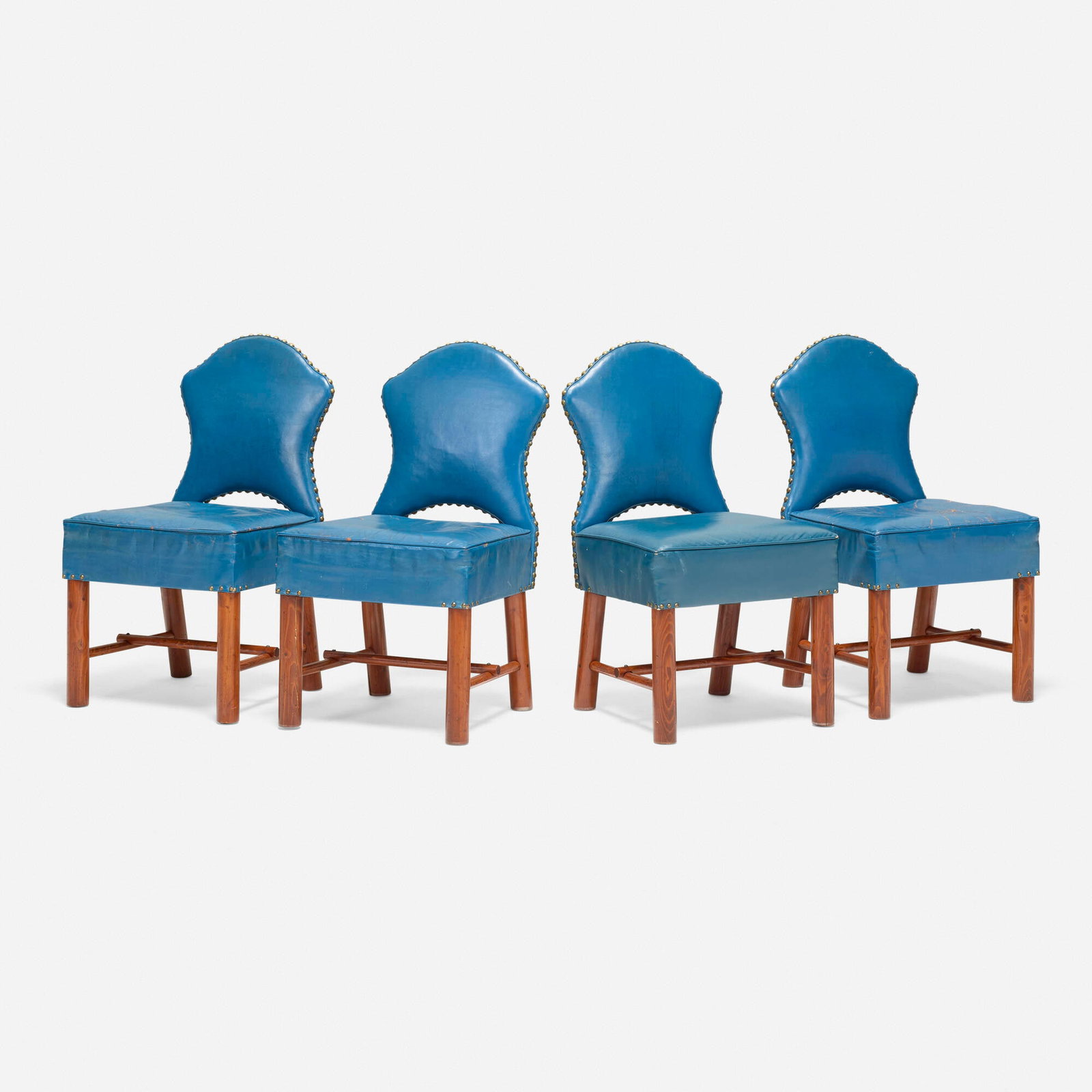 Thomas Molesworth, Keyhole chairs from Hunter Hereford Ranch, Jackson Hole, set of four: Thomas Molesworth Keyhole chairs from Hunter Hereford Ranch, Jackson Hole, set of four USA, c. 1945 fir, leather, hammered brass 36.25 h x 20.5 w x 22 d in (92 x 52 x 56 cm) These chairs were c