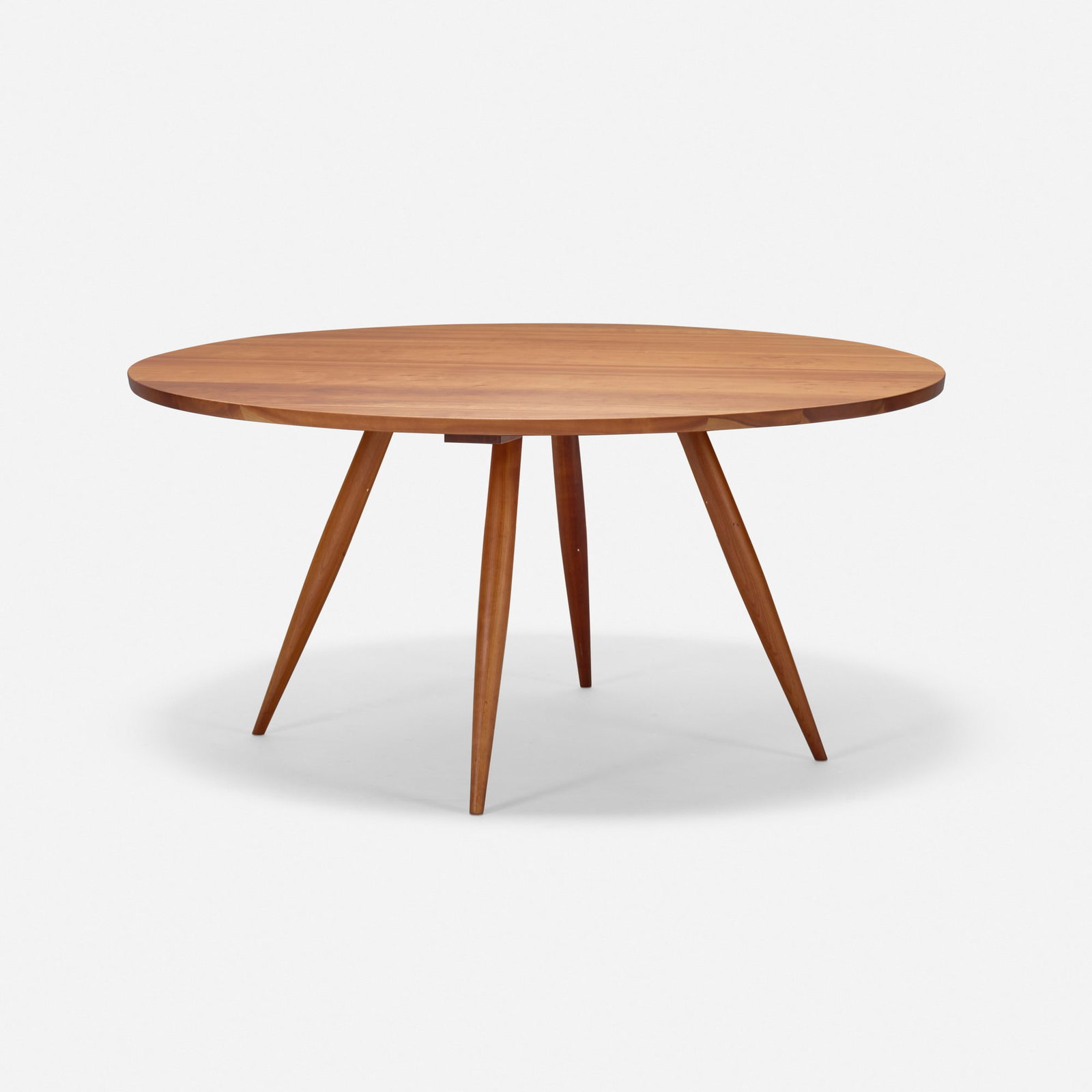 George Nakashima, Round Turned-Leg dining table: George Nakashima Round Turned-Leg dining table Nakashima Studio USA, 1958 cherry 29 h x 60 dia in (74 x 152 cm) Sold with a digital copy of the original order card. Provenan
