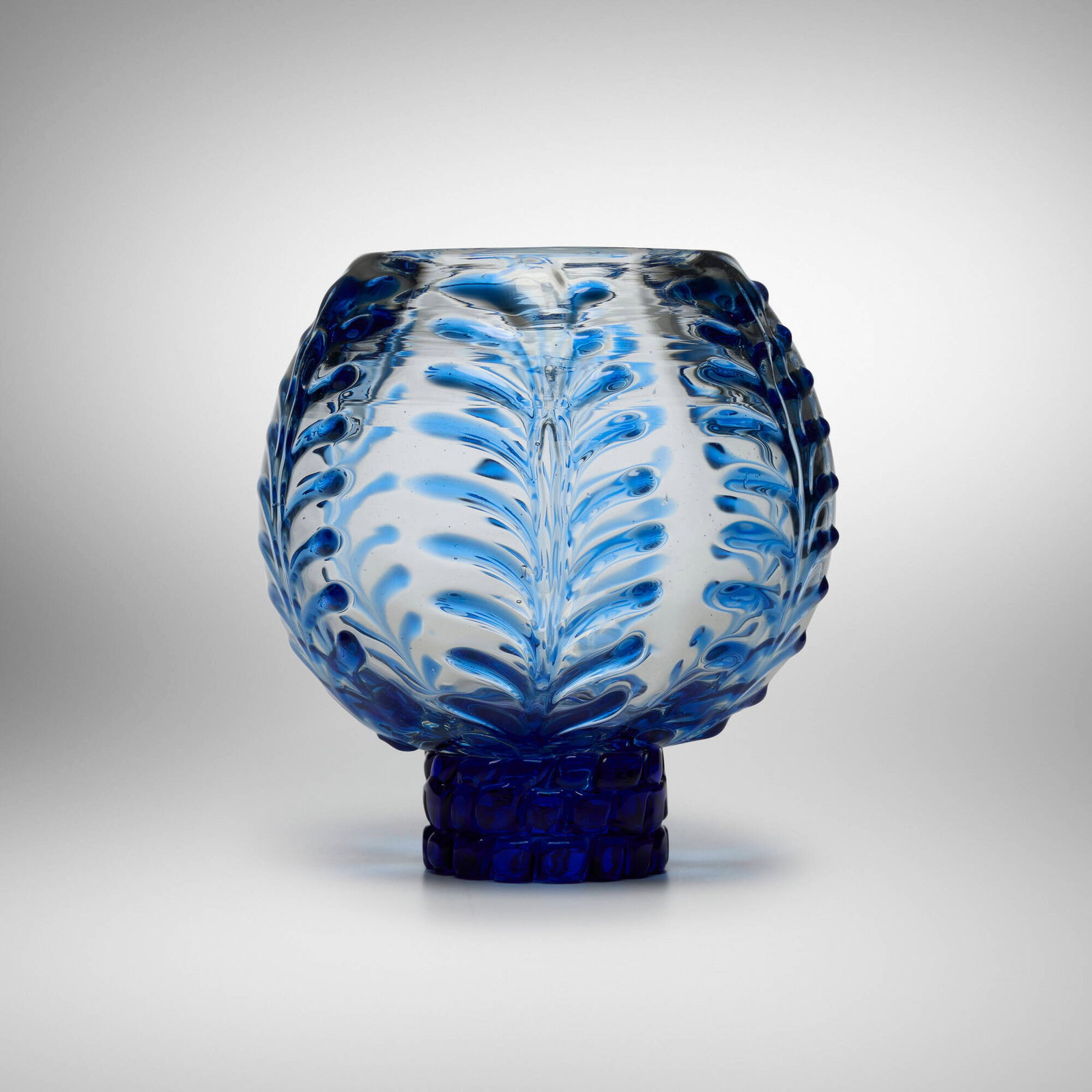 Tomaso Buzzi, A Rilievi vase: Tomaso Buzzi A Rilievi vase Venini Italy, c. 1933 glass with raised decoration and murrina base 8 h x 7.5 dia in (20 x 19 cm) Signed with two-line acid stamp to underside 'Venini Mura