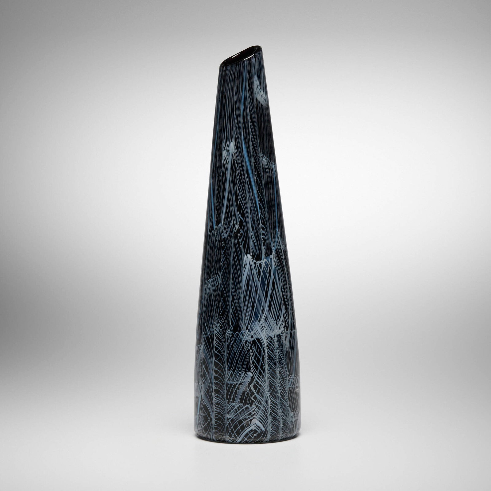 Paulo Venini, Mosaico Zanfirico vase: Paulo Venini Mosaico Zanfirico vase Venini Italy, 1954 internally decorated glass 10.5 h x 2.875 dia in (27 x 7 cm) Signed with three-line acid stamp to underside 'Venini Murano Itali