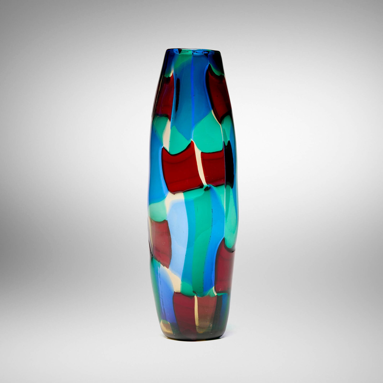 Fulvio Bianconi, Pezzato vase: Fulvio Bianconi Pezzato vase Venini Italy, c. 1951 fused glass tesserae 11.5 h x 3.5 dia in (29 x 9 cm) Signed with three-line acid stamp to underside 'Venini Murano Italia'.