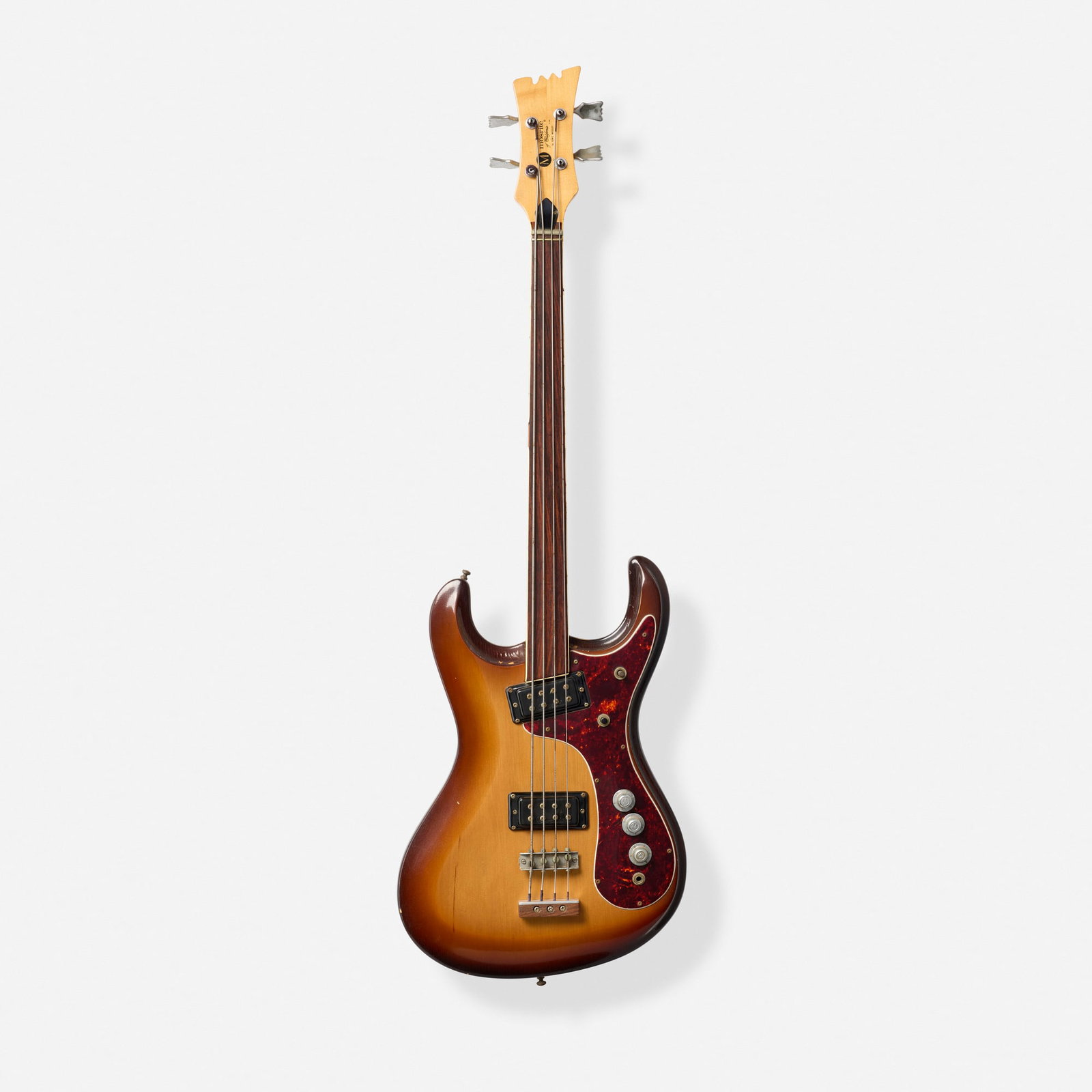 Mosrite of California by Semie Moseley, Mark X Solidbody Electric Bass Guitar, 1972: Mosrite of California by Semie Moseley Mark X Solidbody Electric Bass Guitar, 1972 Bakersfield, USA Fretless, three knobs, duckfoot tuners, finished and assembled by Gene Moles Finish: Brownburst<