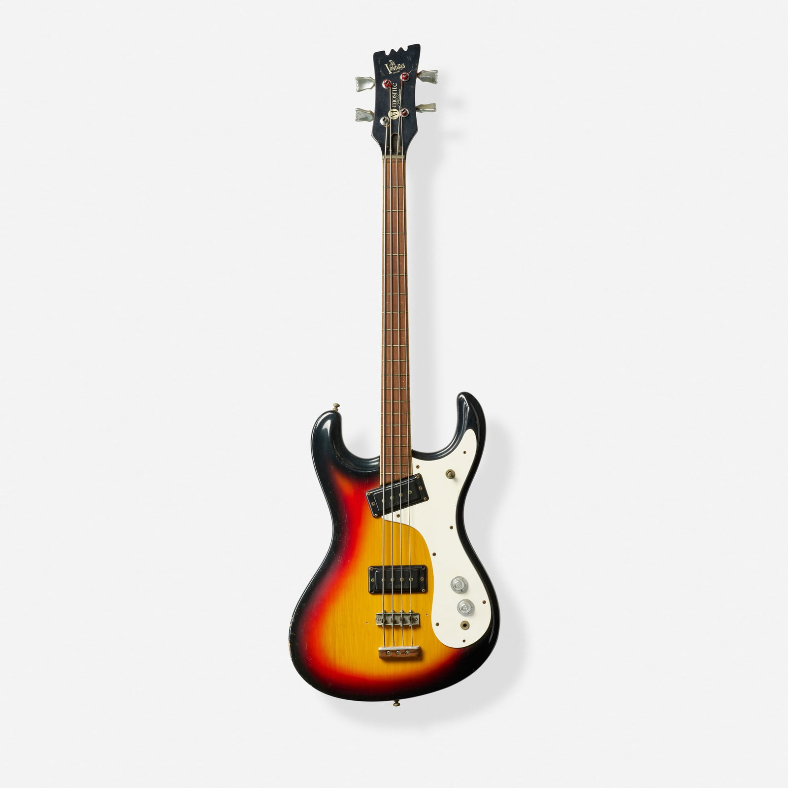 Mosrite, The Ventures Model Solidbody Electric Bass Guitar, 1967: Mosrite The Ventures Model Solidbody Electric Bass Guitar, 1967 Bakersfield, USA Two single-coil pickups, duckfoot tuners Finish: Sunburst Serial number: 6501 Sold with hardshell case.