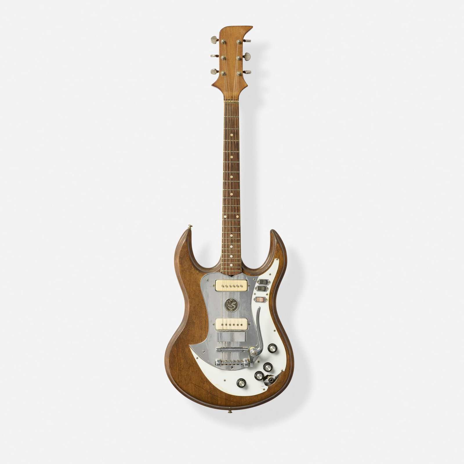 Standel, Custom Deluxe Solidbody Electric Guitar, c. 1966: Standel Custom Deluxe Solidbody Electric Guitar, c. 1966 Bakersfield, USA German-carved body, vibrato tailpiece Finish: Brown Serial number: 1-42 Sold with hardshell case. Pro