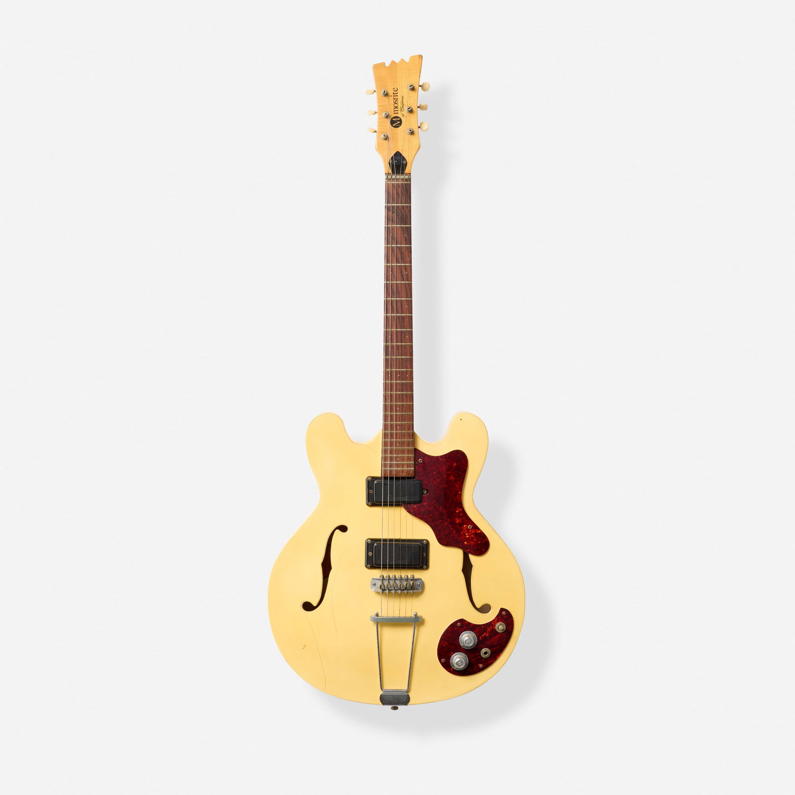 Mosrite of California, Celebrity Hollowbody Electric Guitar, 1968: Mosrite of California Celebrity Hollowbody Electric Guitar, 1968 Bakersfield, USA Trapeze tailpiece, 3-bolt neck Finish: White Serial number: K0909 Sold with hardshell case. P
