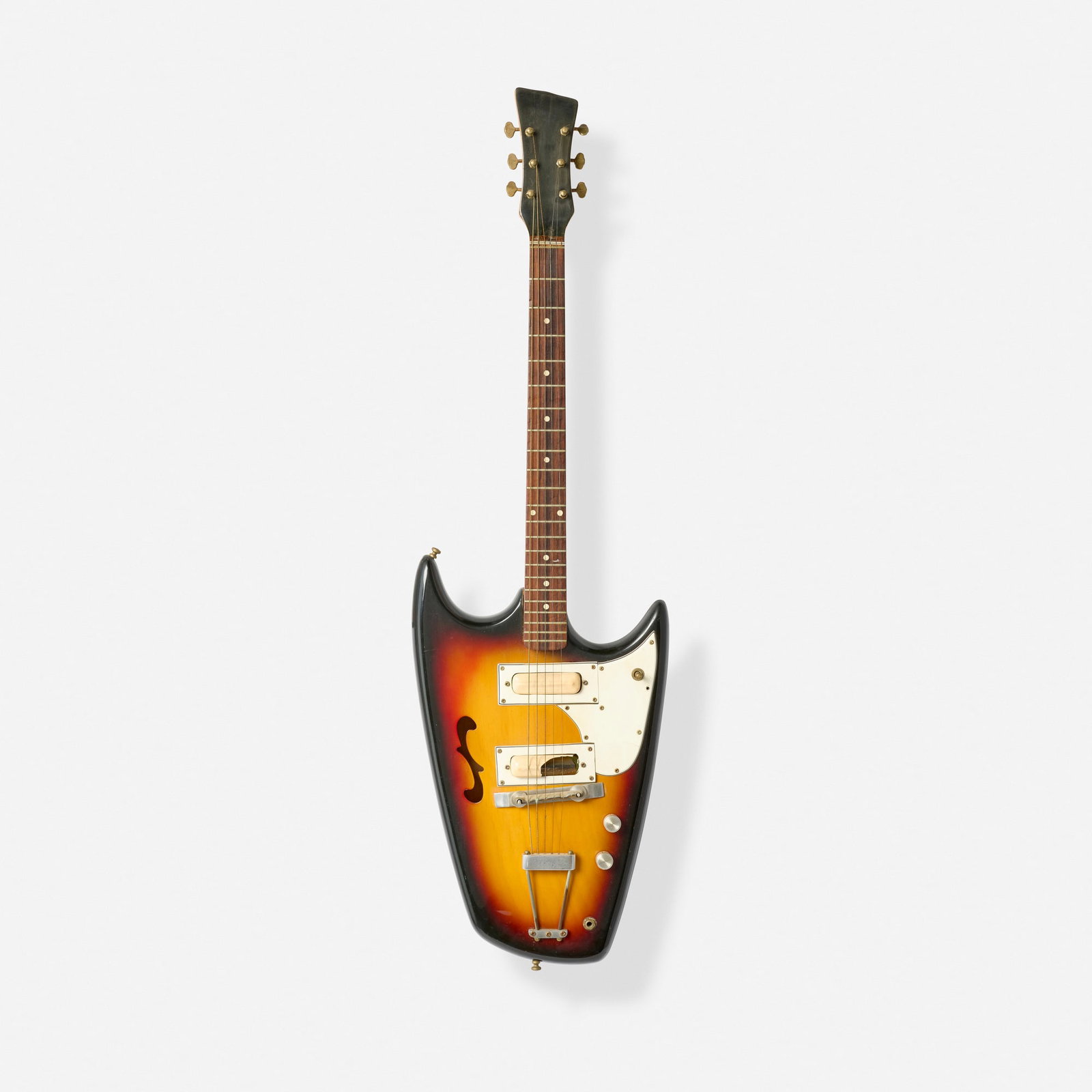 Hallmark Mfg. Co., Swept Wing Semi-hollowbody Electric Guitar, 1967: Hallmark Mfg. Co. Swept Wing Semi-hollowbody Electric Guitar, 1967 Arvin, USA Standel pickups, trapeze tailpiece, assembled from parts Finish: Sunburst Sold with Gibson chipboard case.