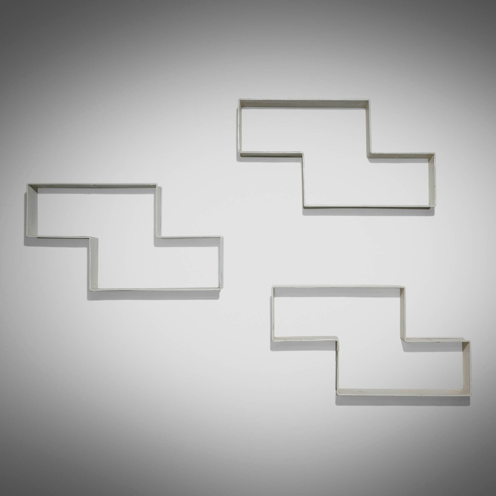 Mathieu Mategot, Dedal shelves, set of three: Mathieu Mategot Dedal shelves, set of three Atelier Mategot France, 1956 enameled and perforated steel 19.25 h x 35.25 w x 7.625 d in (49 x 90 x 19 cm) Literature: Mat