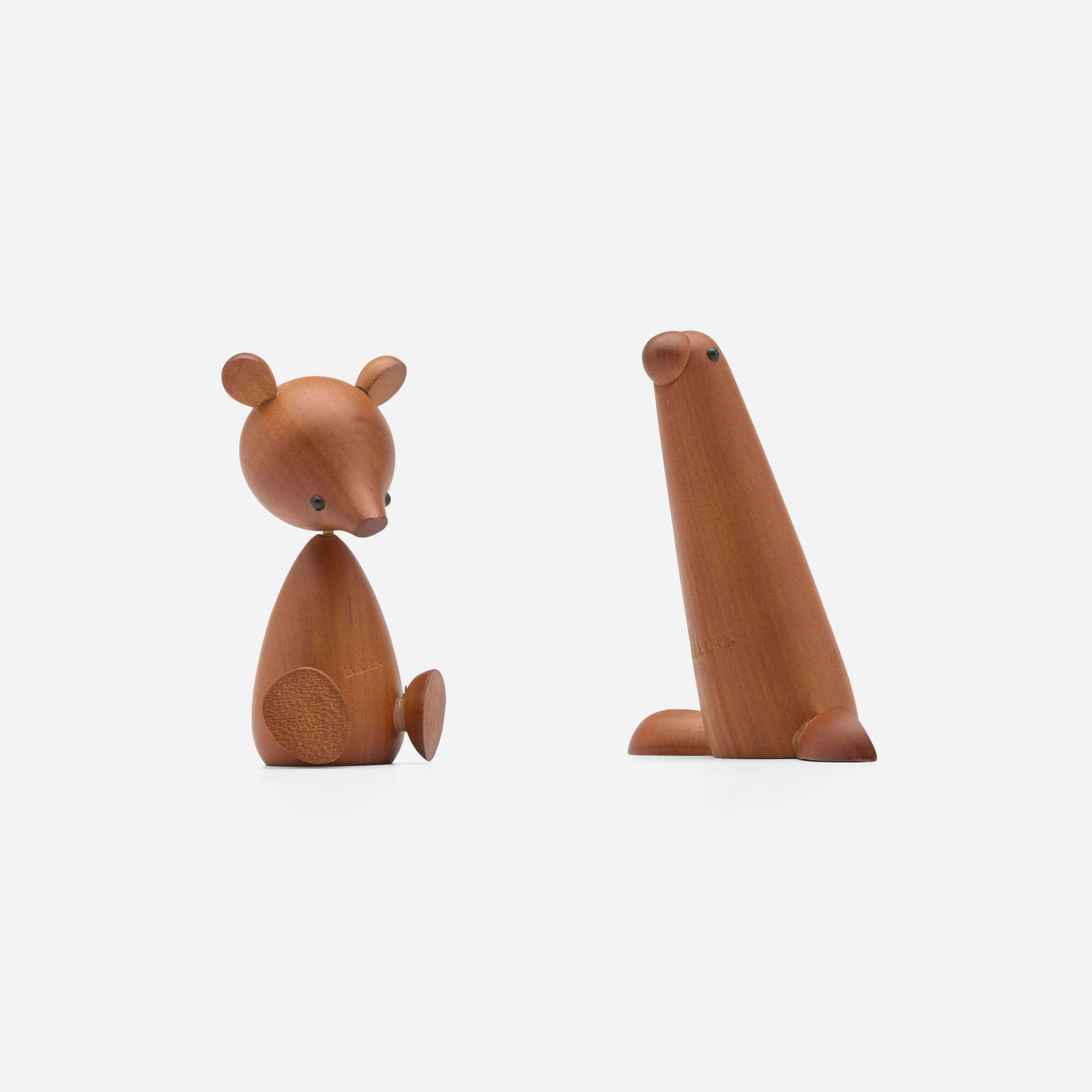 Sensukai, Bear and sea lion from the Royal Pet series: Sensukai Bear and sea lion from the Royal Pet series c. 1965 teak, enameled metal 4.25 h x 4 w x 1.5 d in (11 x 10 x 4 cm) 4.125 h x 2.125 w x 1.875 d in (10 x 5 x 5 cm) Branded manufacturer