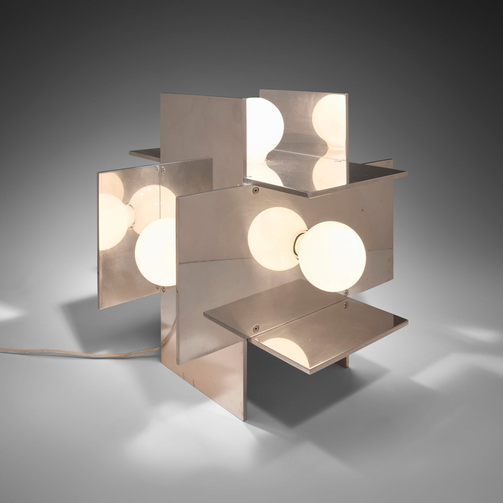 Paul Mayen, Table lamp: Paul Mayen Table lamp Habitat USA, c. 1973 mirror-polished aluminum 15 h x 15 w x 15 d in (38 x 38 x 38 cm) This work will ship from Chicago, Illinois.