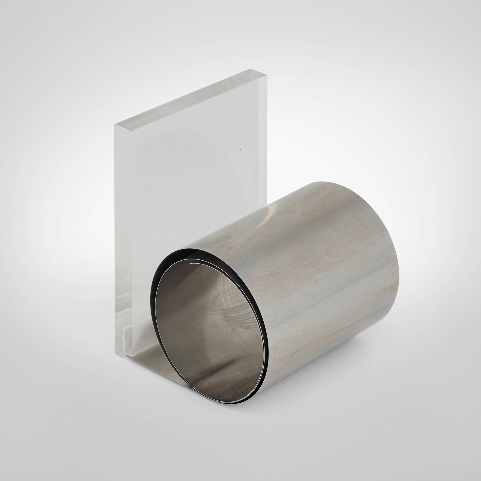 Roche Bobois, Bookend: Roche Bobois Bookend France, c. 1975 aluminum, acrylic 5 h x 4 w x 4 d in (13 x 10 x 10 cm) This work will ship from Chicago, Illinois.