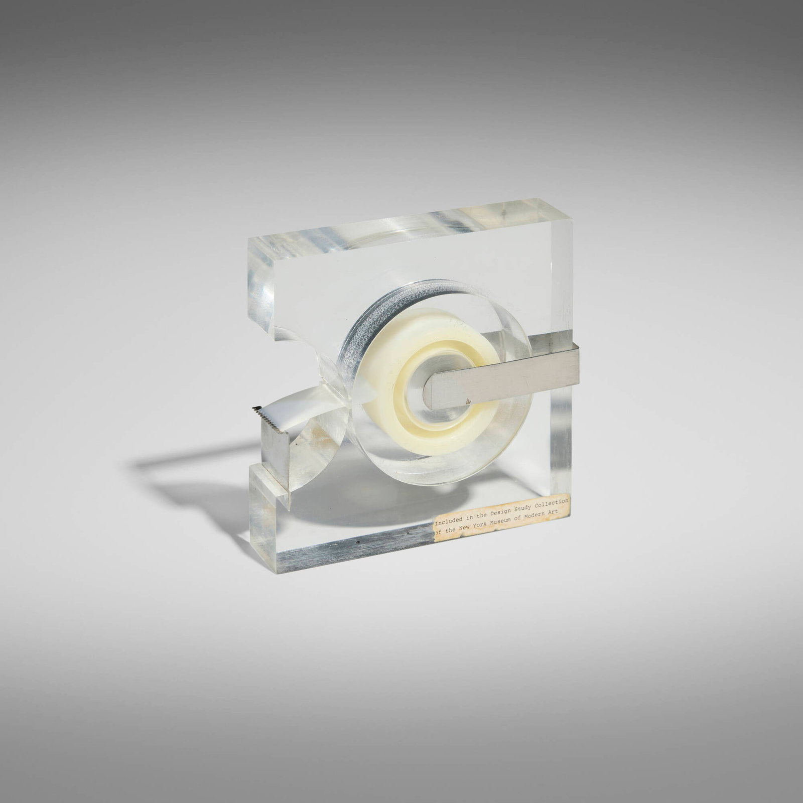 Robert P. Gottlieb, Tape dispenser: Robert P. Gottlieb Tape dispenser Two's Company USA, 1963 Lucite, chrome-plated steel 4.125 h x 4.125 w x 1 d in (10 x 10 x 3 cm) An example of this design is in the permanent collection of the